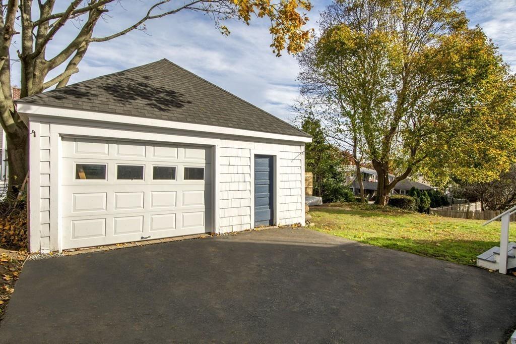 20 Bay Ridge Road Scituate, MA 02066 - Photo 9 of 41 a front view of a house with a garden