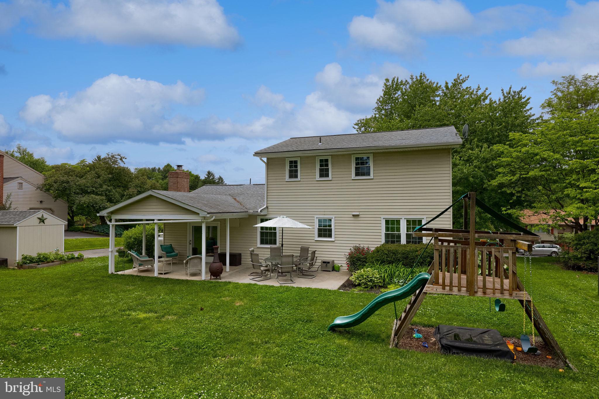 1019 Devonshire Road Lancaster, PA 17601 - Photo 33 of 35 a view of a house with a yard deck and a slide
