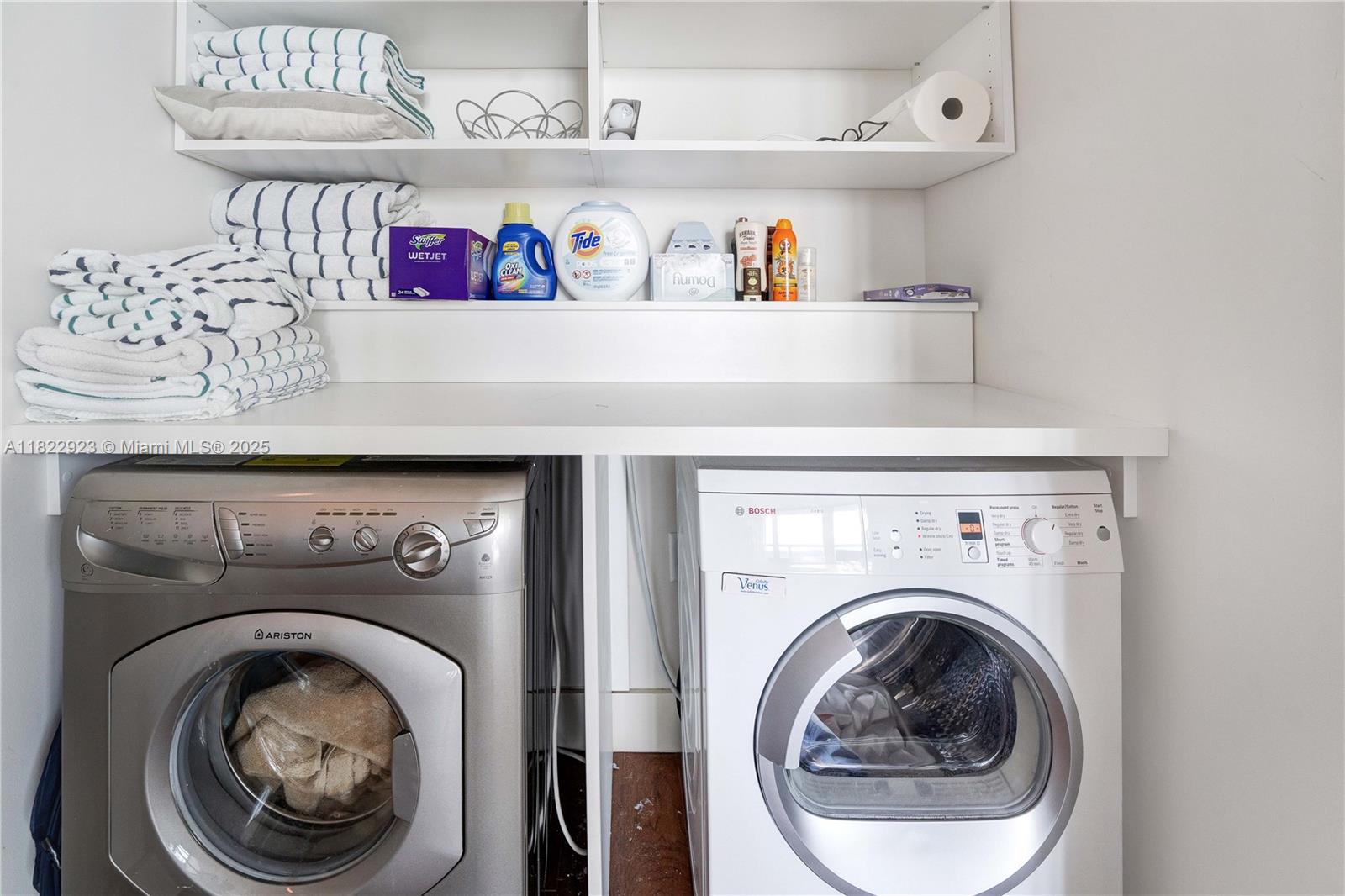 6899 Collins Avenue, Unit 1409 Miami Beach, FL 33141 - Photo 20 of 35 a utility room with dryer and washer