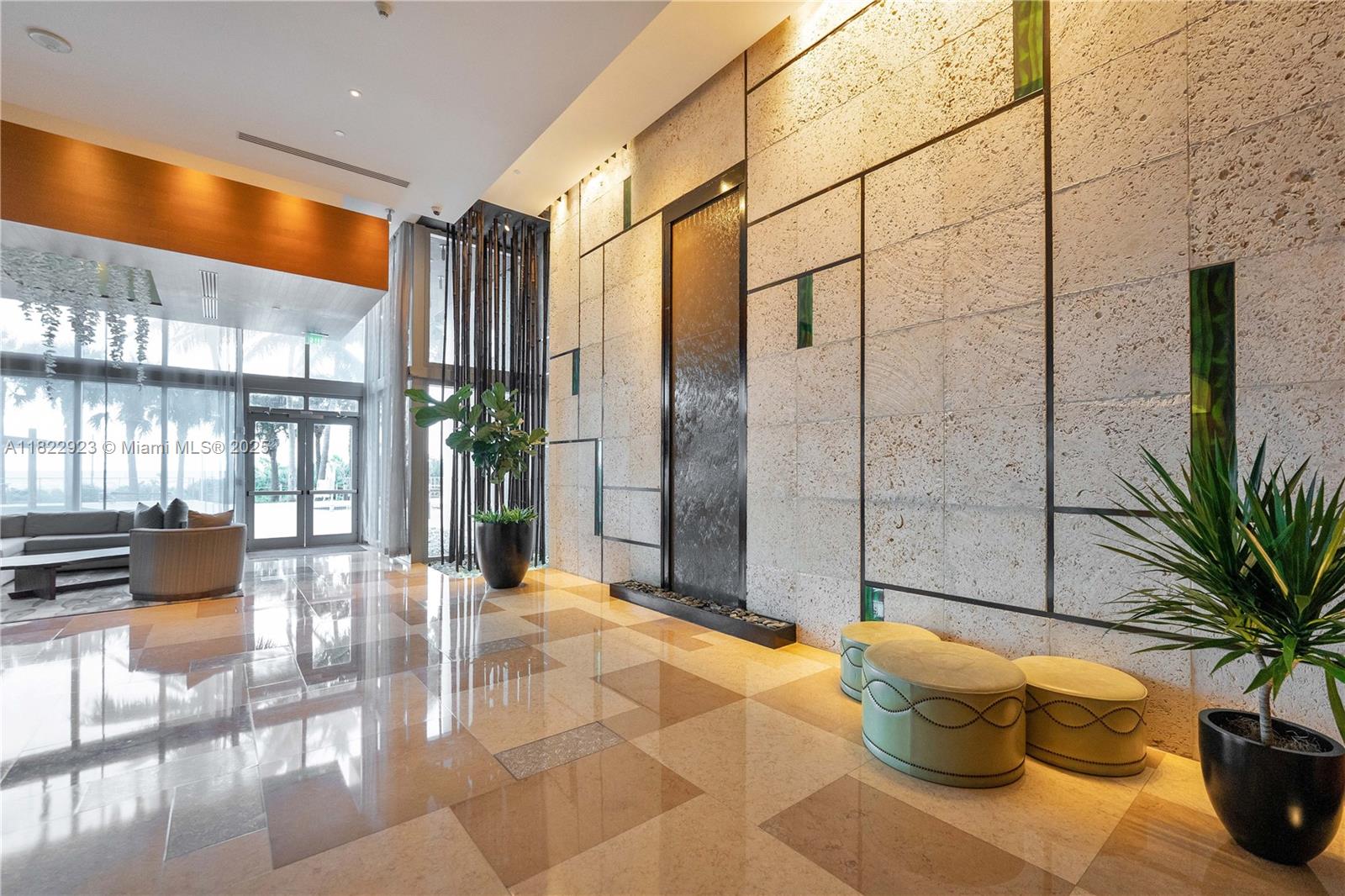 6899 Collins Avenue, Unit 1409 Miami Beach, FL 33141 - Photo 32 of 35 a view of interior space with plants and wooden tub