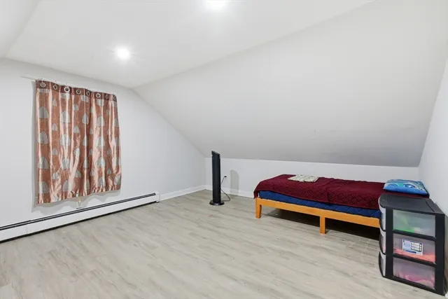 a room with furniture and a wooden floor