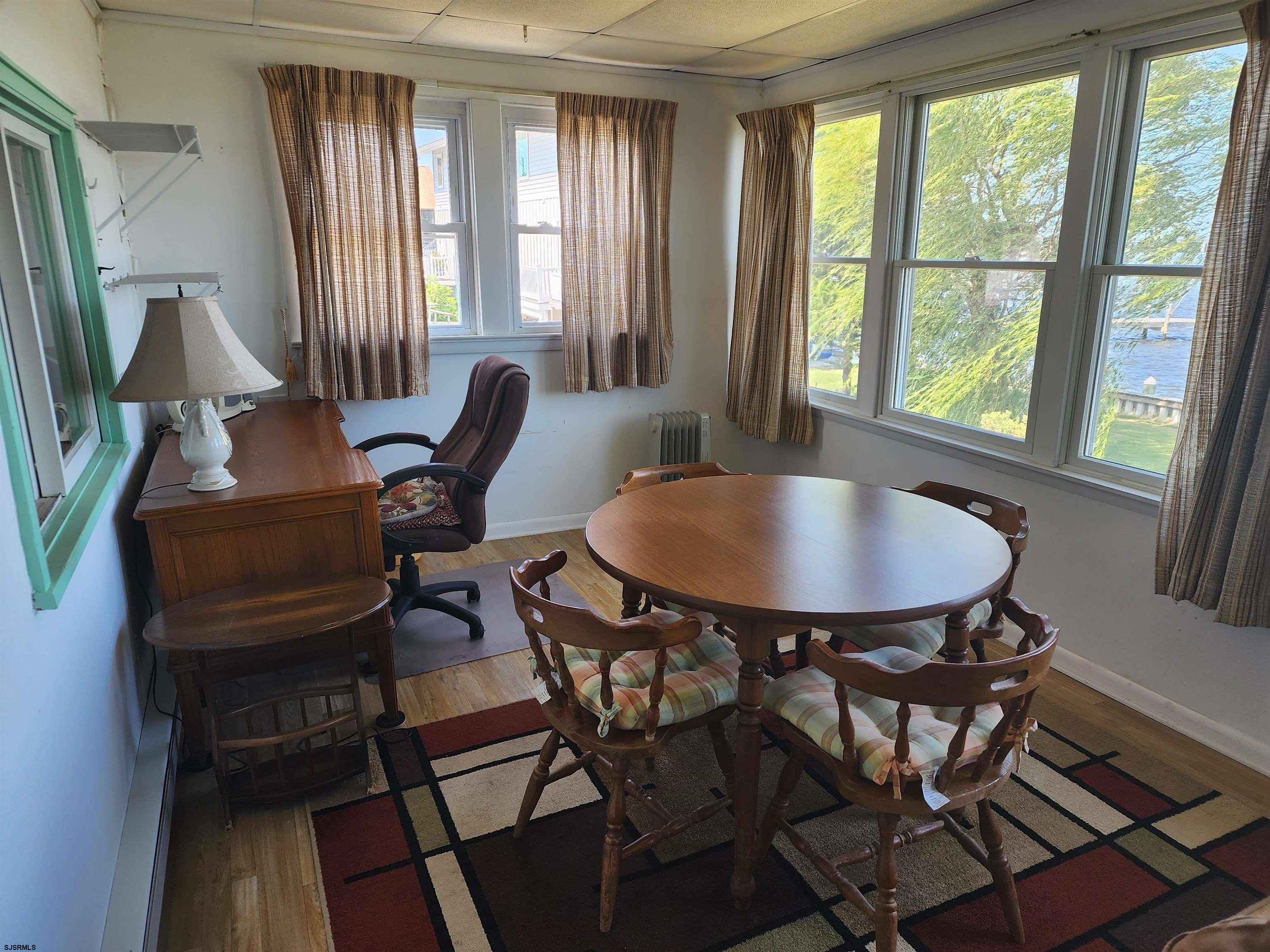 17 River Road Port Republic, NJ 08241 - Photo 12 of 17 a dining room with furniture and window