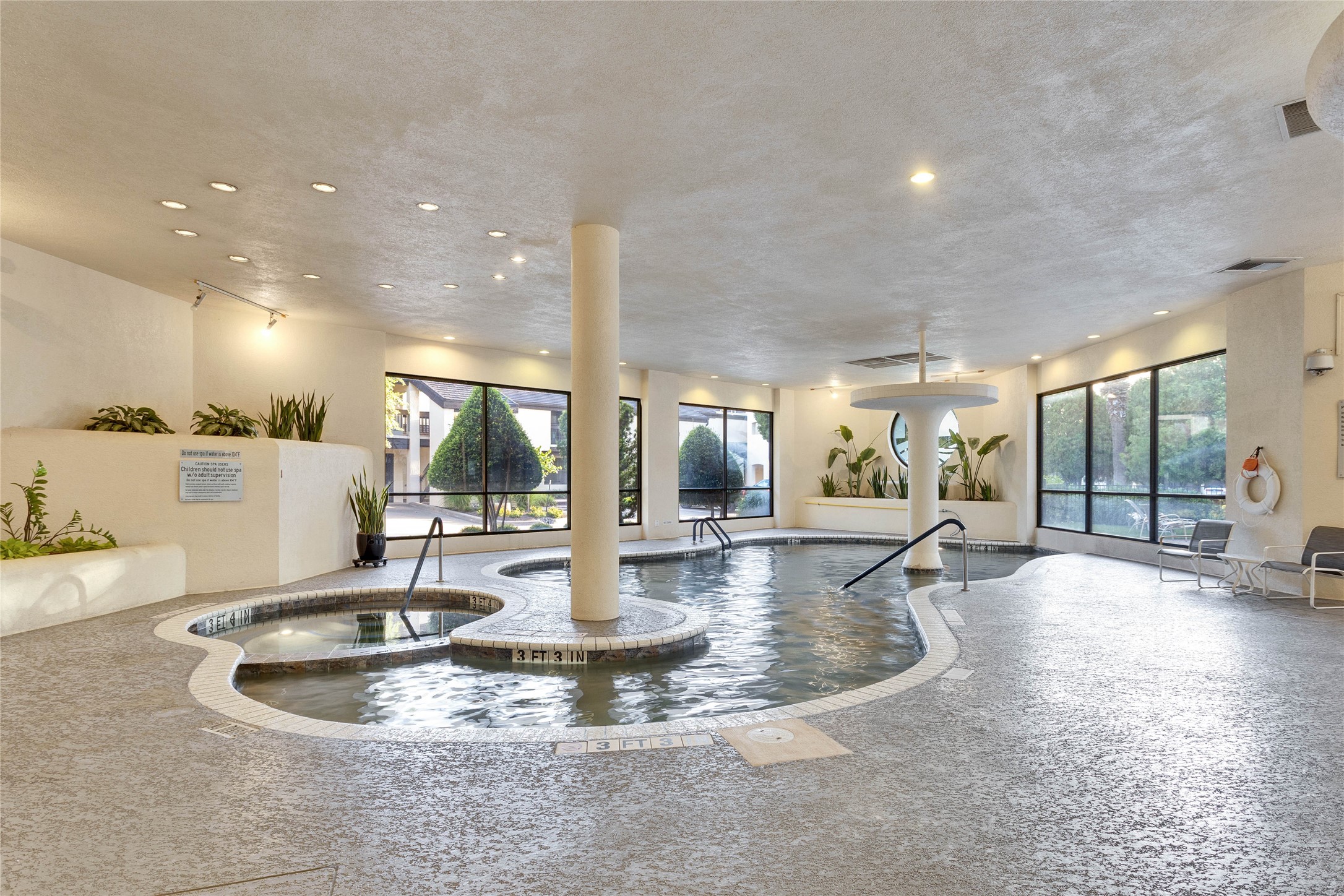 40 North Interstate Highway 35, Unit 7B1 Austin, TX 78701 - Photo 17 of 21 A heated indoor pool and spa area.