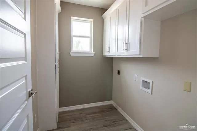 a view of cabinets and window