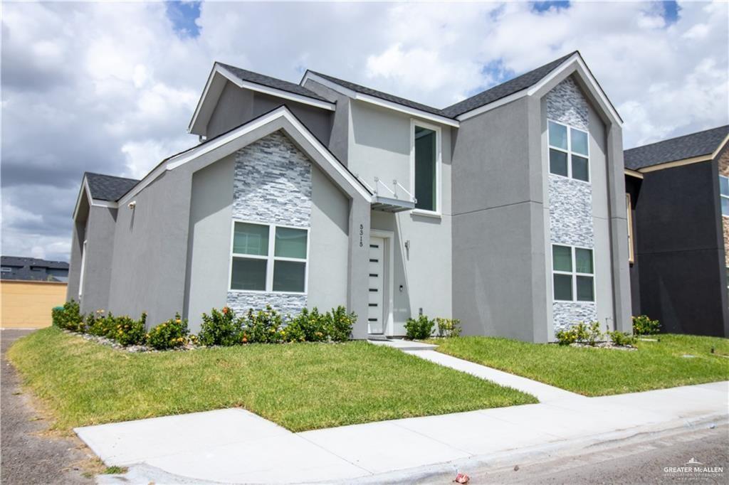 5315 North Crown Point Pharr, TX 78577 - Photo 2 of 30 a front view of a house with garden