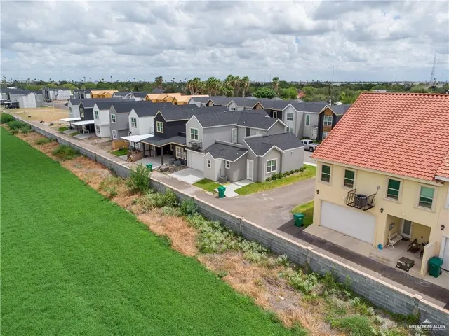 an aerial view of a house with a garden