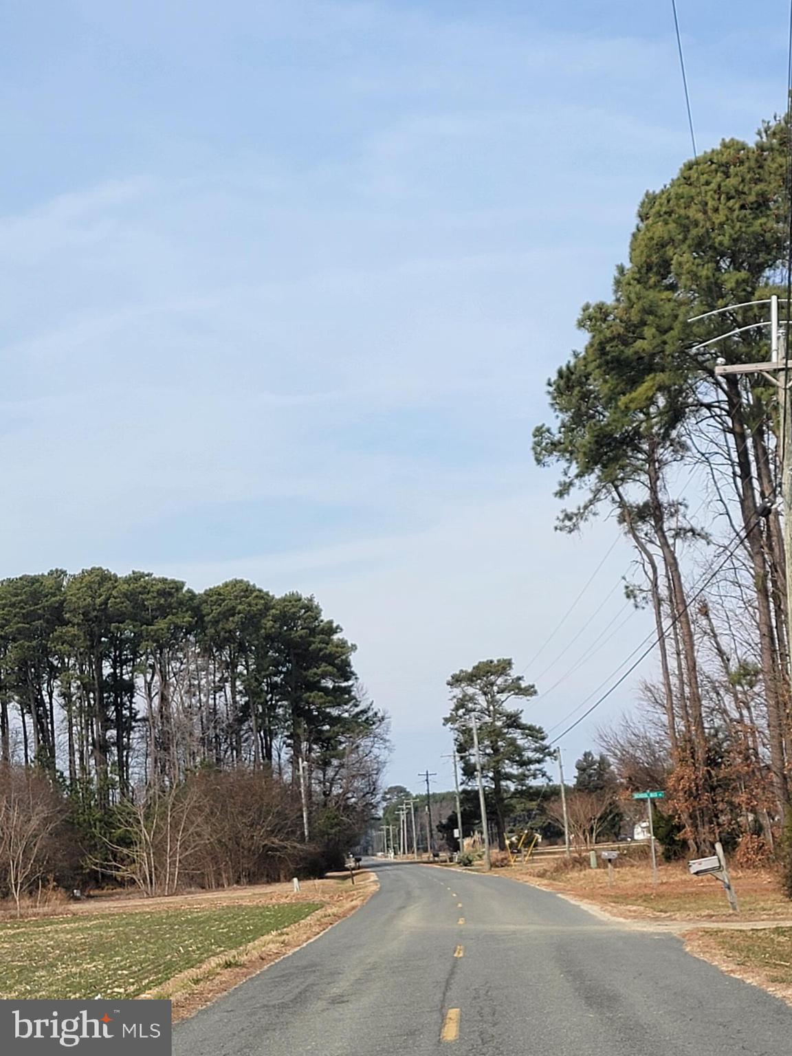 961 Ferry Road Heathsville, VA 22473 - Photo 6 of 6 a view of a street with a building in the background