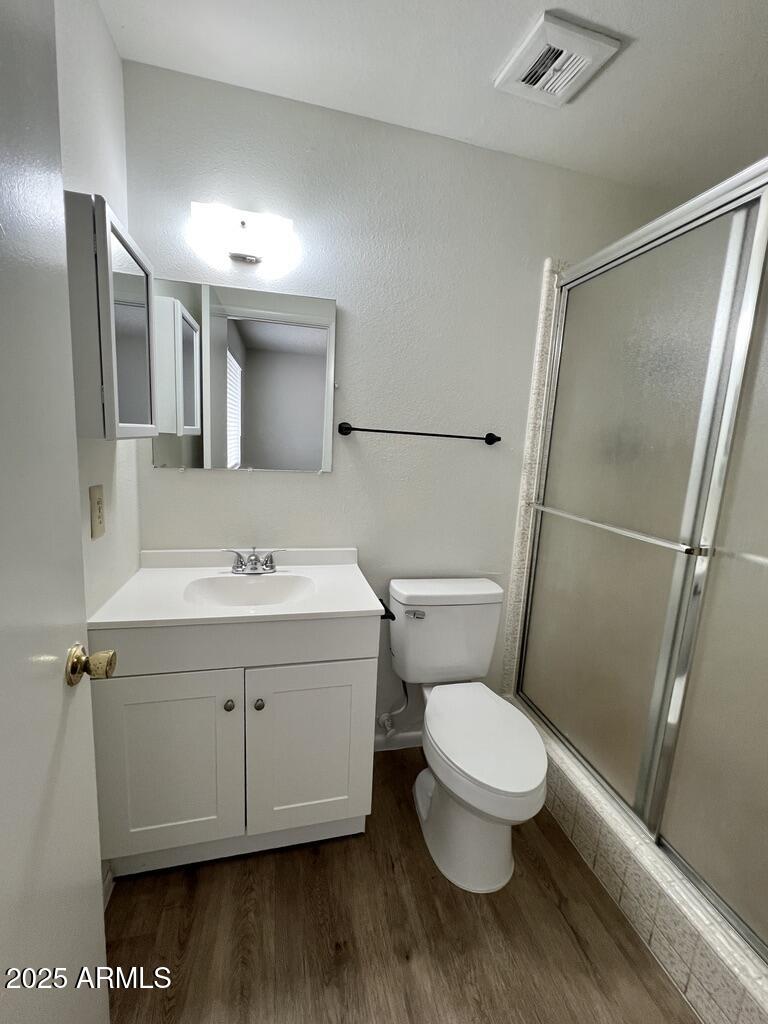 710 East Fordham Drive Tempe, AZ 85283 - Photo 11 of 12 a bathroom with a sink a toilet and shower