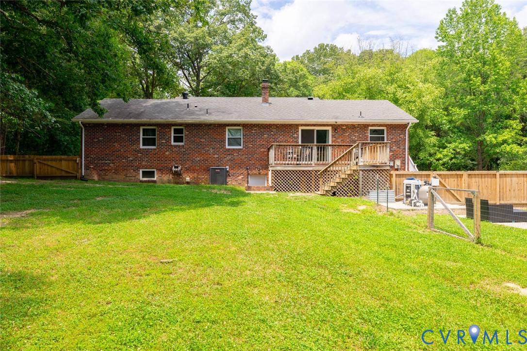 12397 New Market Mill Road Beaverdam, VA 23015 - Photo 36 of 44 a front view of a house with garden