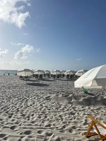 a view of outdoor space with patio furniture and potted plants