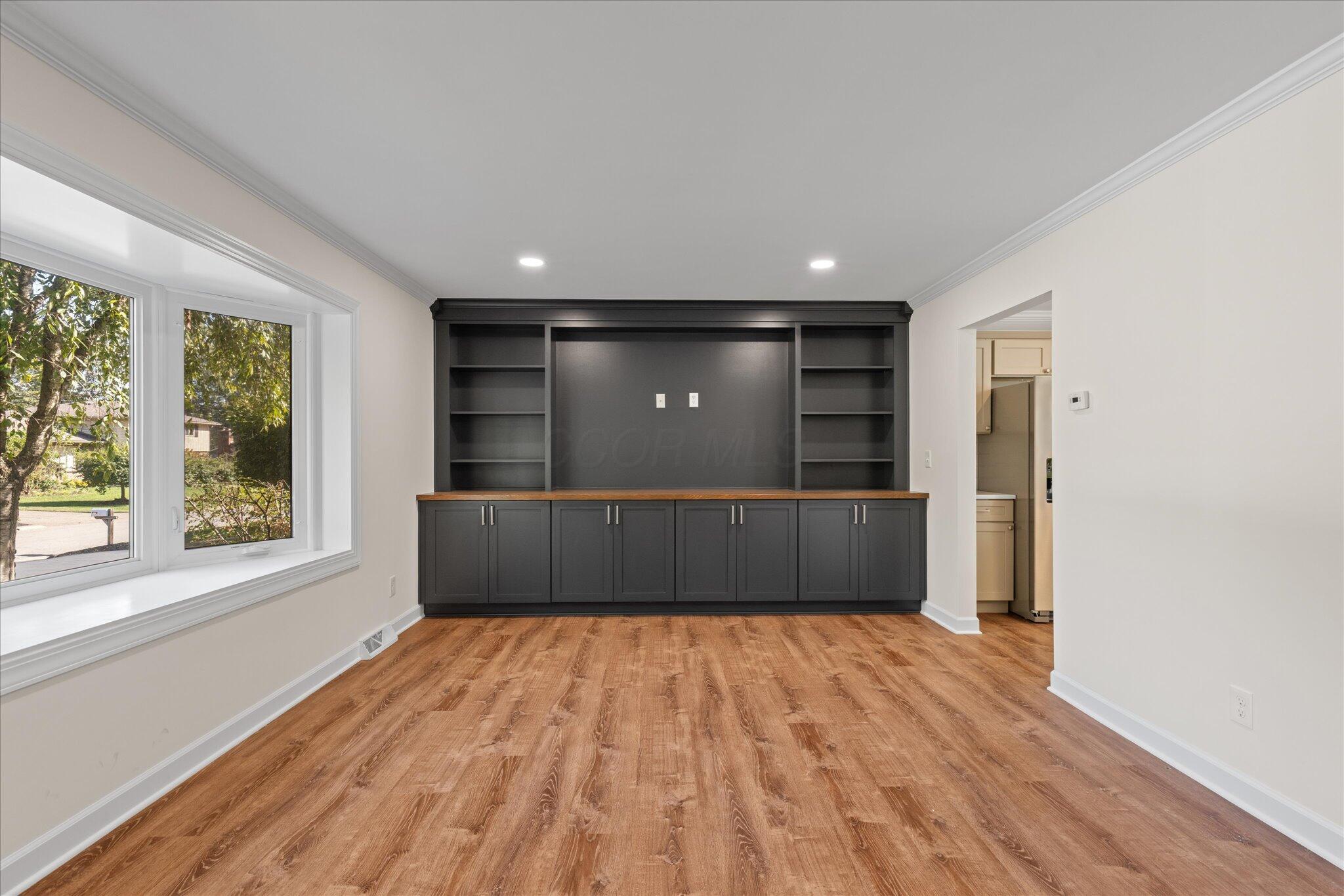 6041 Rocky Rill Road Columbus, OH 43235 - Photo 13 of 46 Custom built Shelving in Living Room