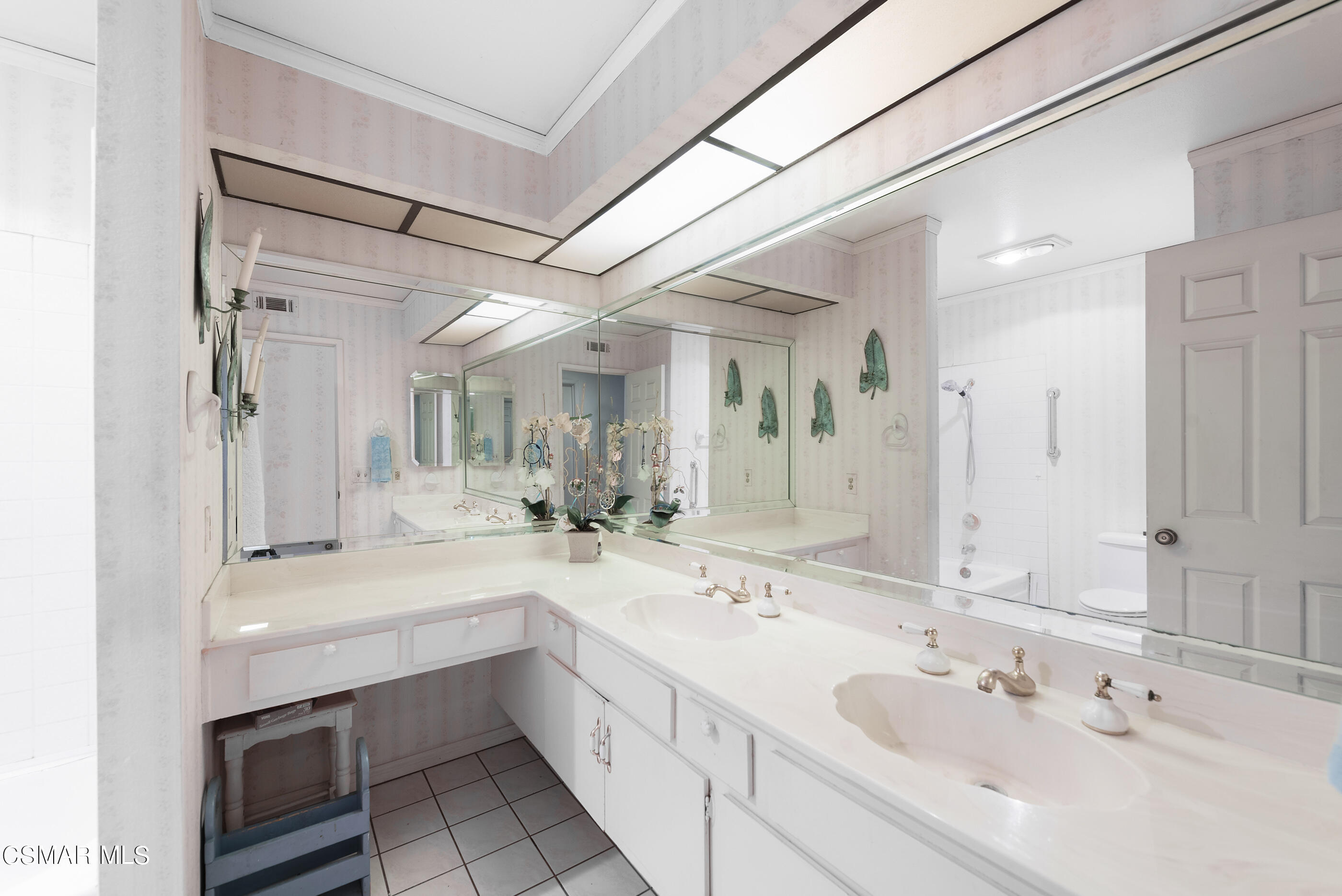 4230 Roxbury Street Simi Valley, CA 93063 - Photo 19 of 40 a bathroom with a sink double vanity granite tub shower and a mirror