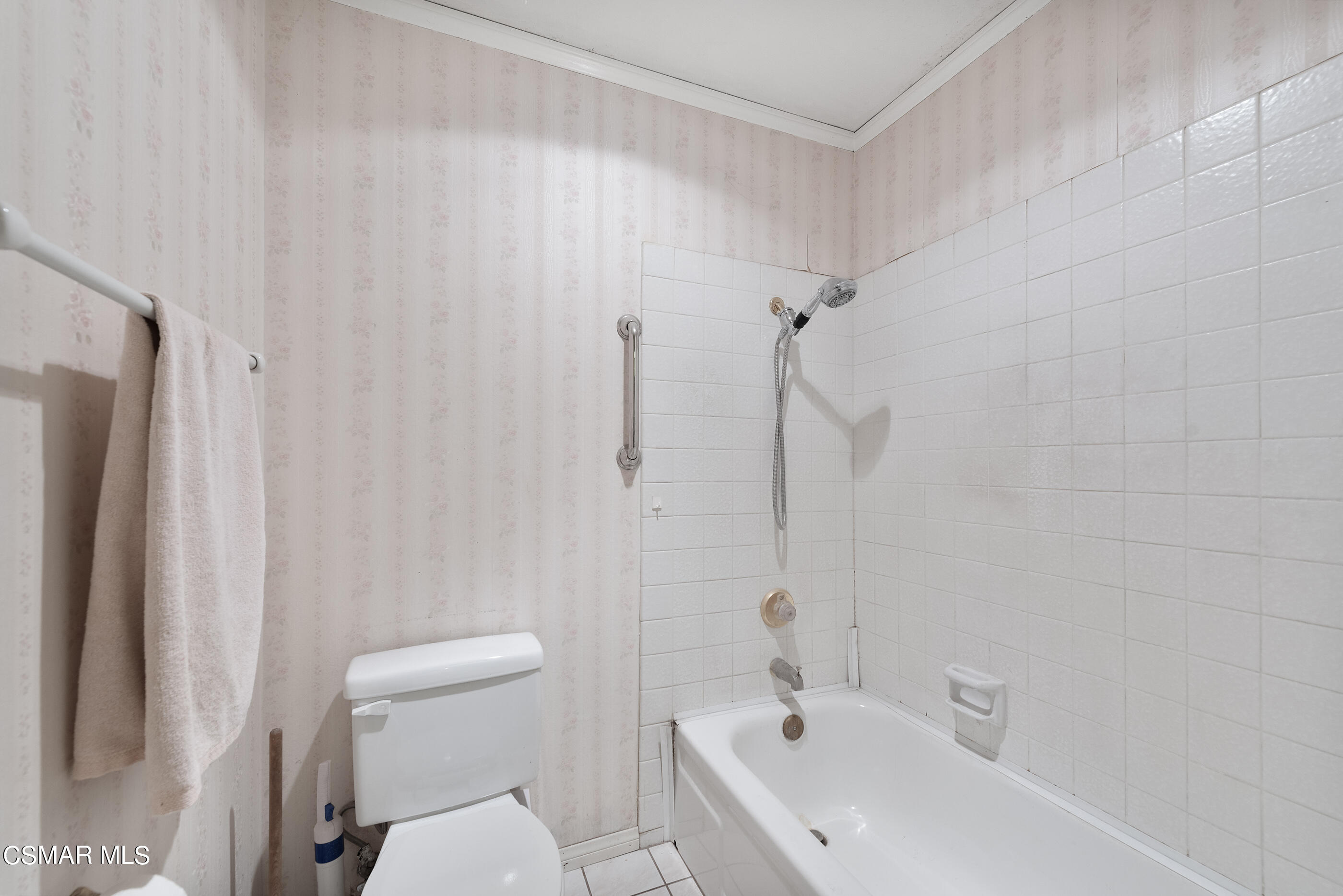 4230 Roxbury Street Simi Valley, CA 93063 - Photo 20 of 40 a white bath tub sitting next to a white toilet