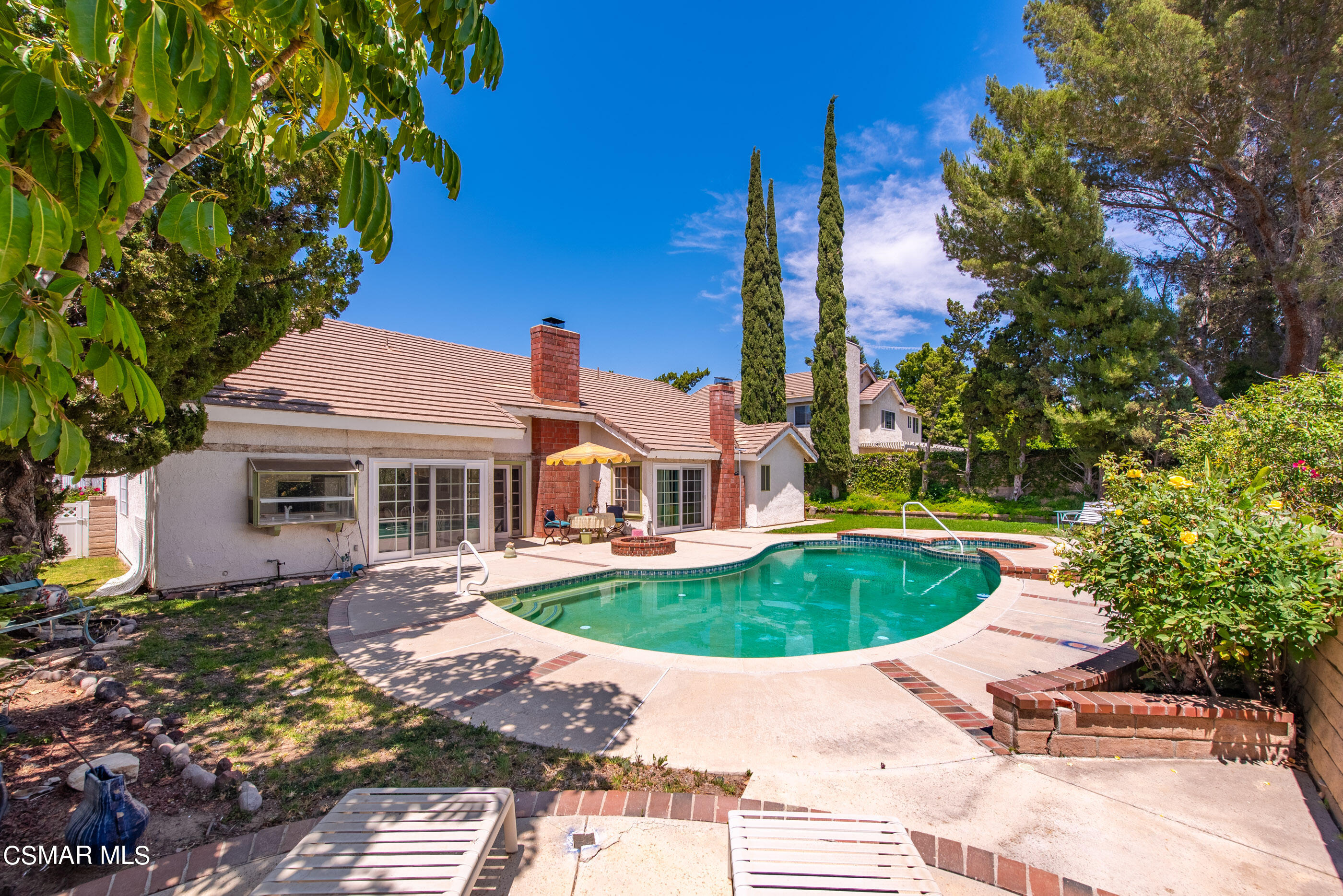 4230 Roxbury Street Simi Valley, CA 93063 - Photo 2 of 40 a front view of a house with garden