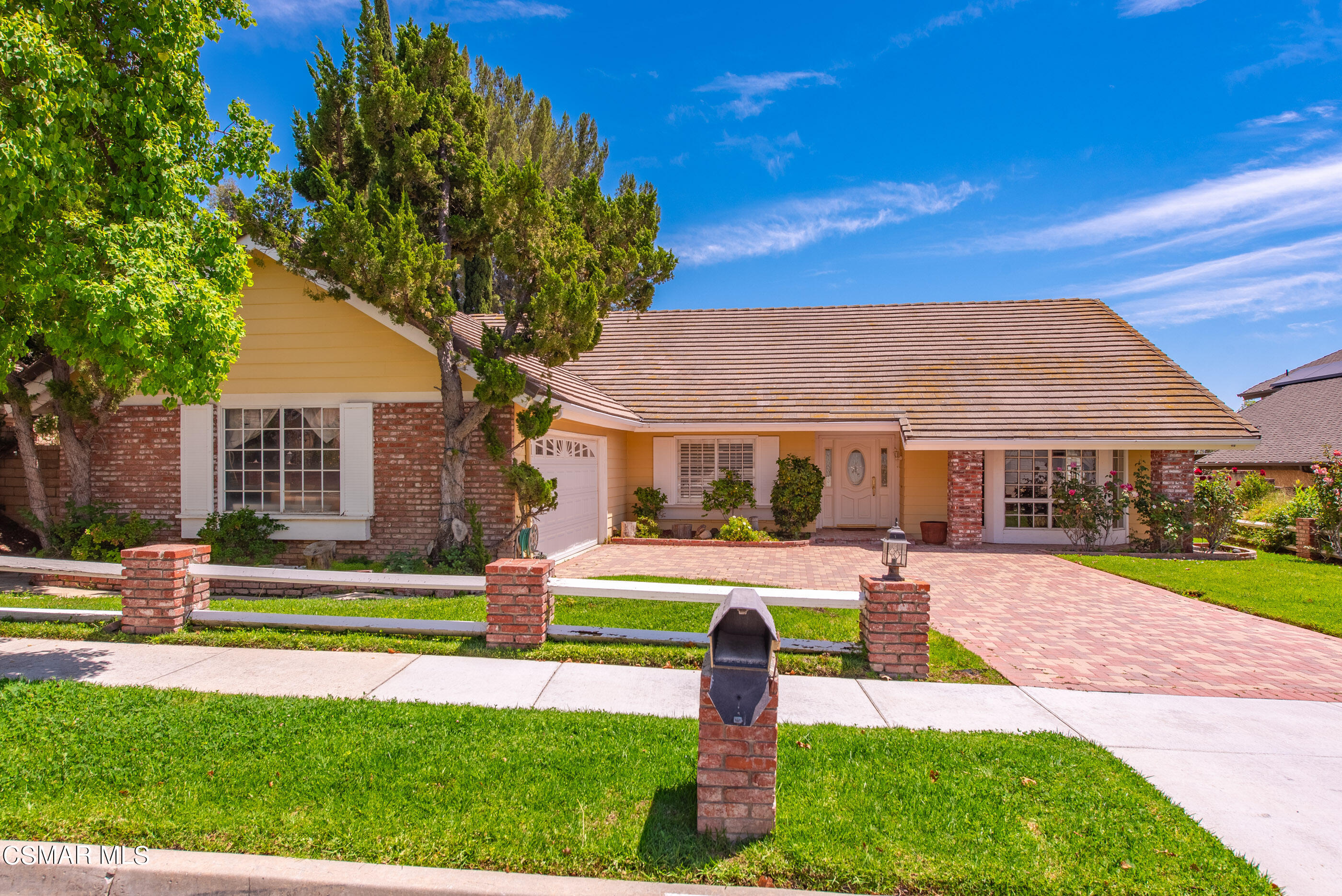 4230 Roxbury Street Simi Valley, CA 93063 - Photo 21 of 40 a front view of a house with a yard