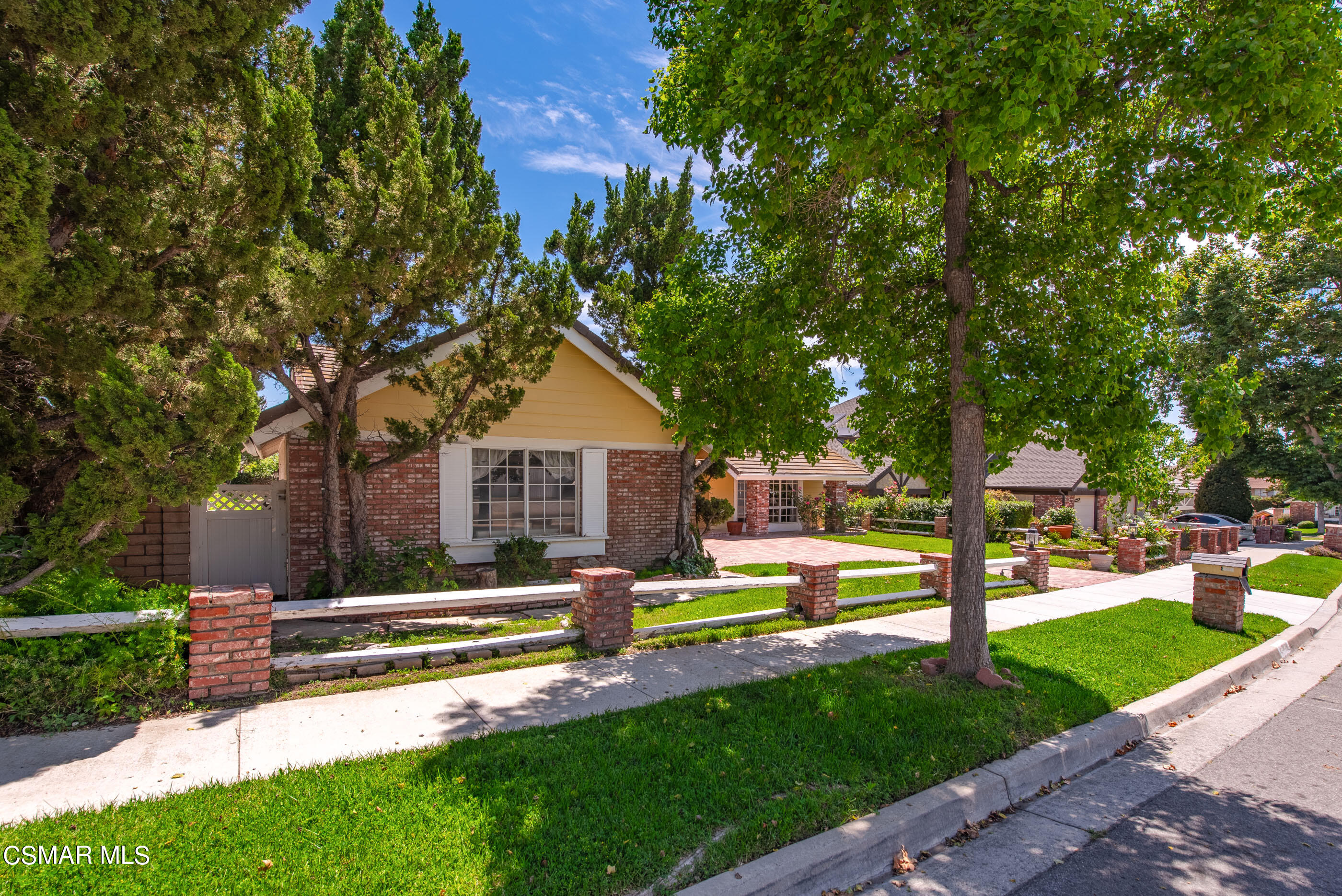 4230 Roxbury Street Simi Valley, CA 93063 - Photo 24 of 40 a front view of a house with a yard