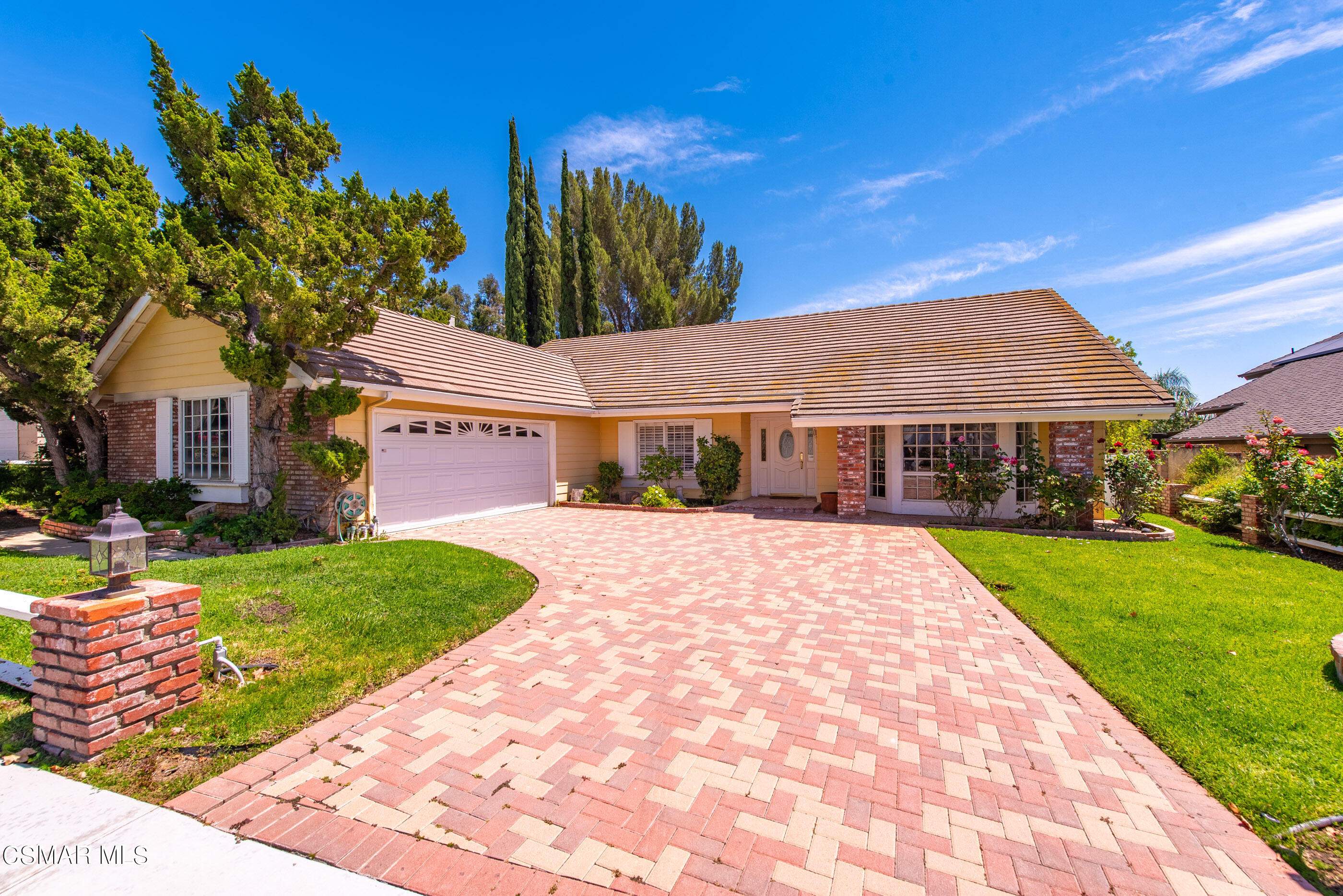 4230 Roxbury Street Simi Valley, CA 93063 - Photo 29 of 40 a front view of a house with a yard