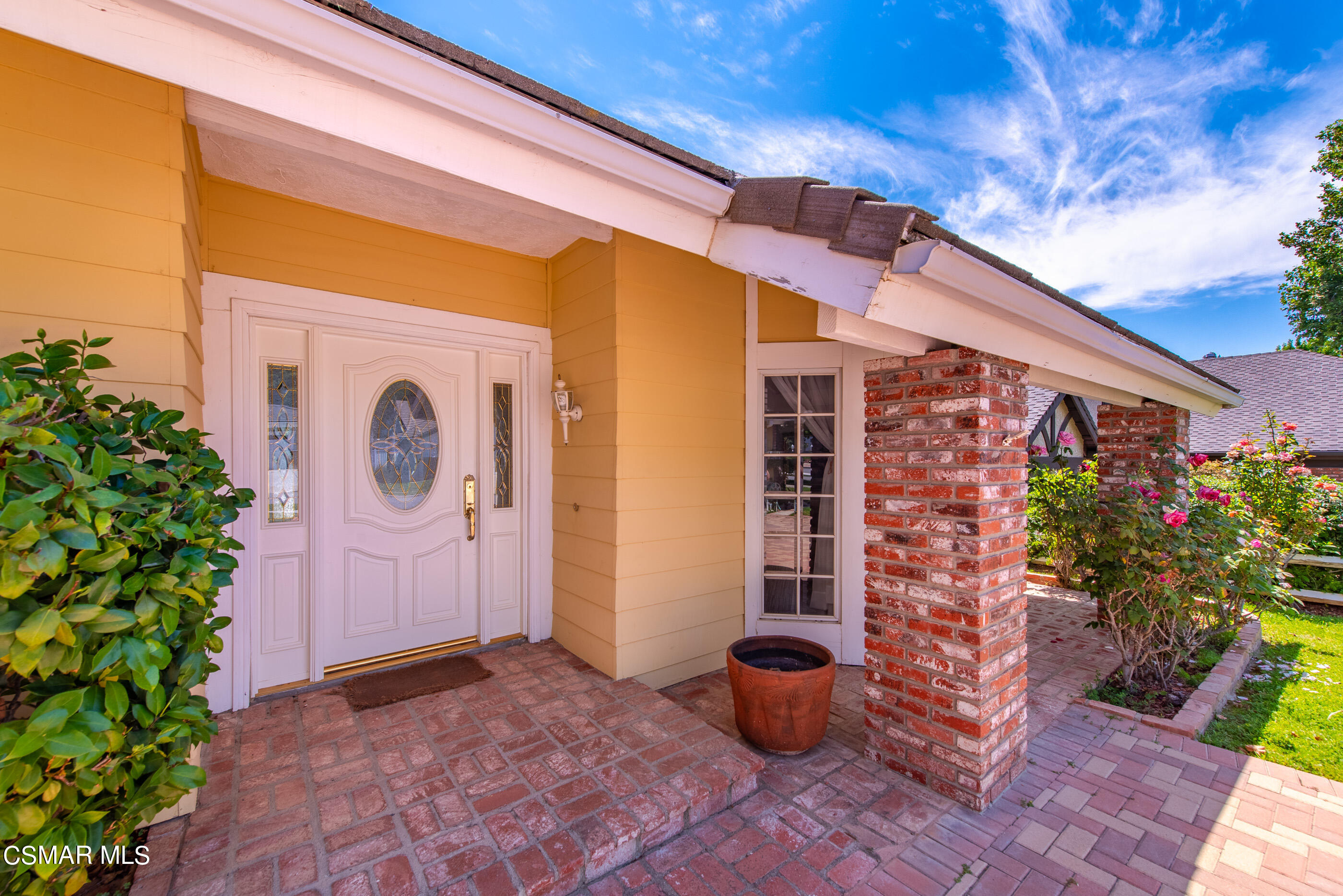4230 Roxbury Street Simi Valley, CA 93063 - Photo 3 of 40 a front view of a house with plants