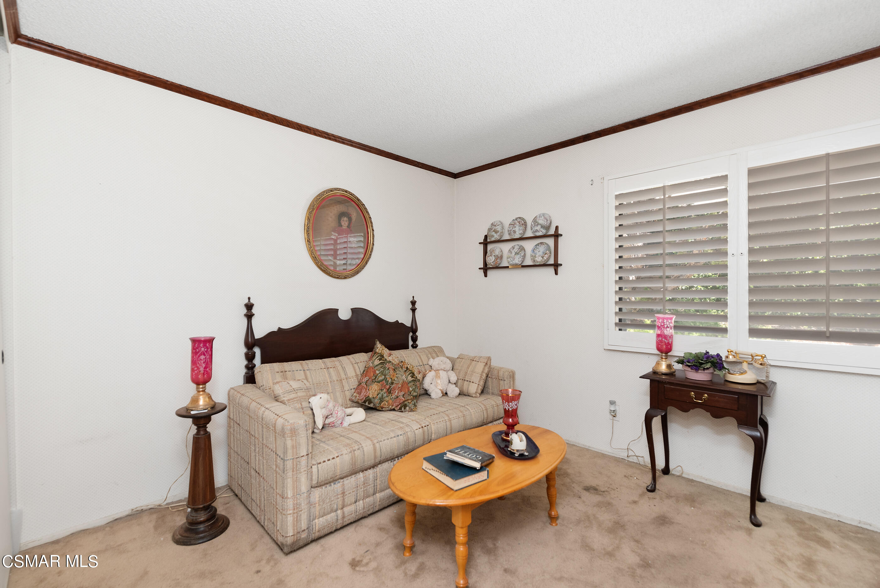 4230 Roxbury Street Simi Valley, CA 93063 - Photo 31 of 40 a living room with furniture and a window