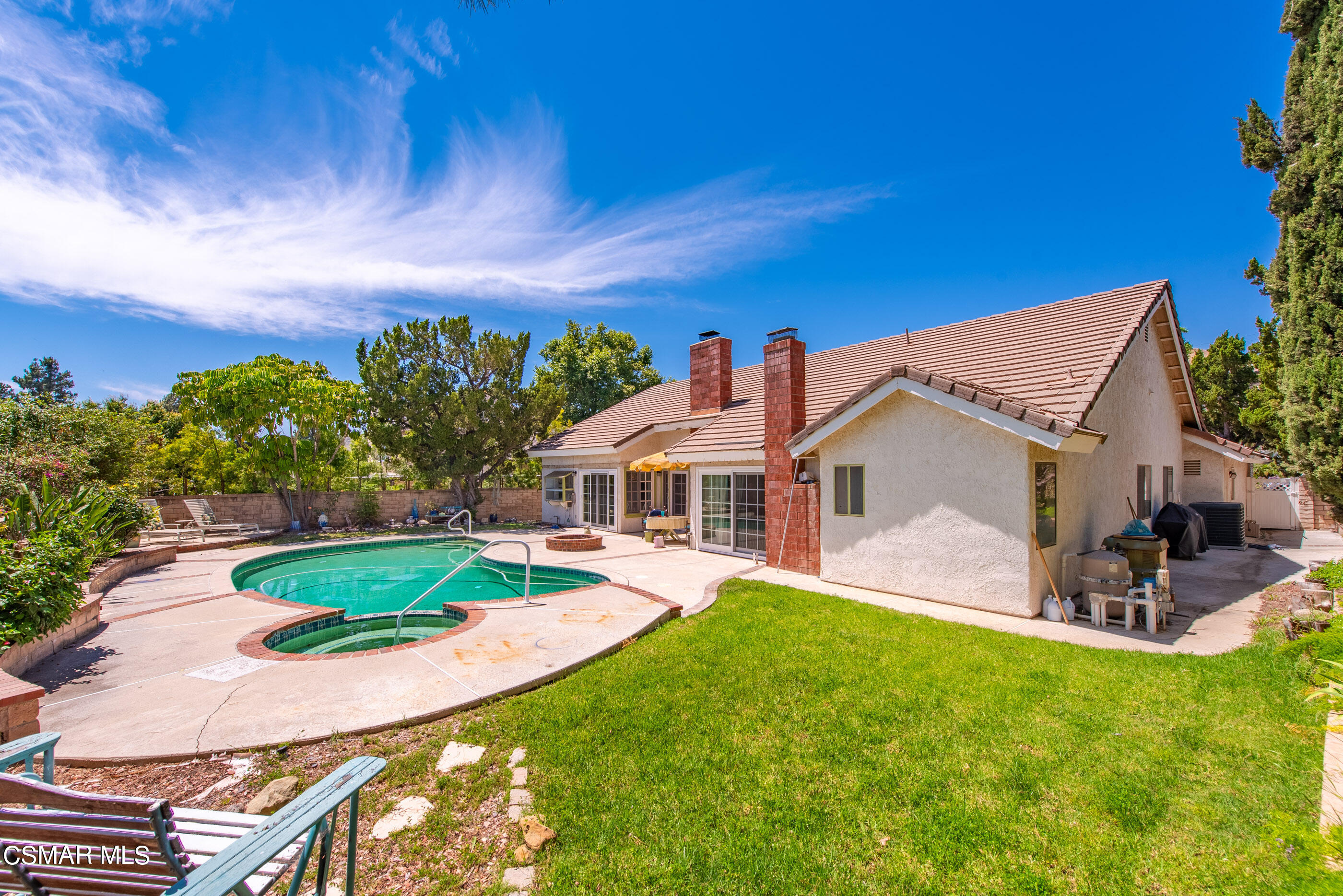 4230 Roxbury Street Simi Valley, CA 93063 - Photo 34 of 40 a front view of a house with garden