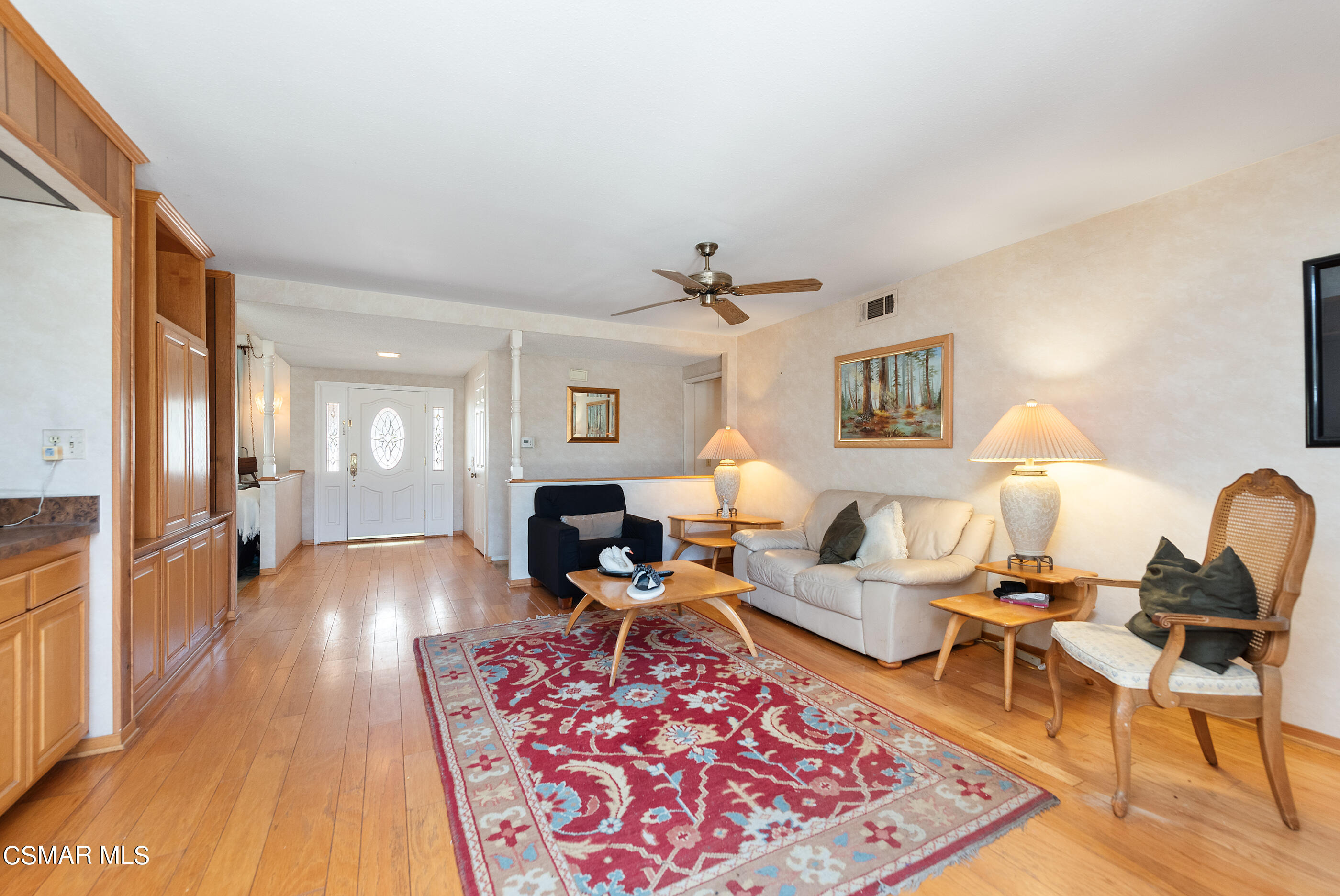 4230 Roxbury Street Simi Valley, CA 93063 - Photo 5 of 40 a living room with furniture and a wooden floor