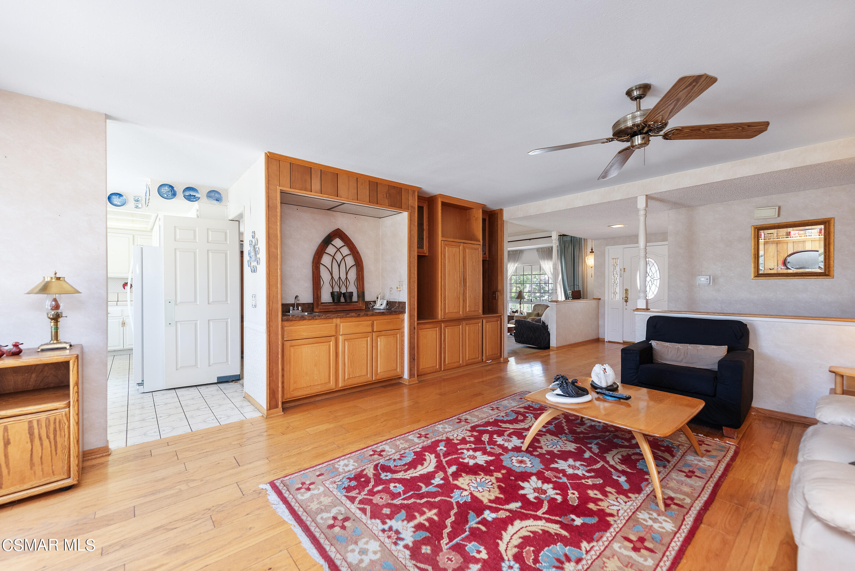 4230 Roxbury Street Simi Valley, CA 93063 - Photo 6 of 40 a living room with furniture and a rug