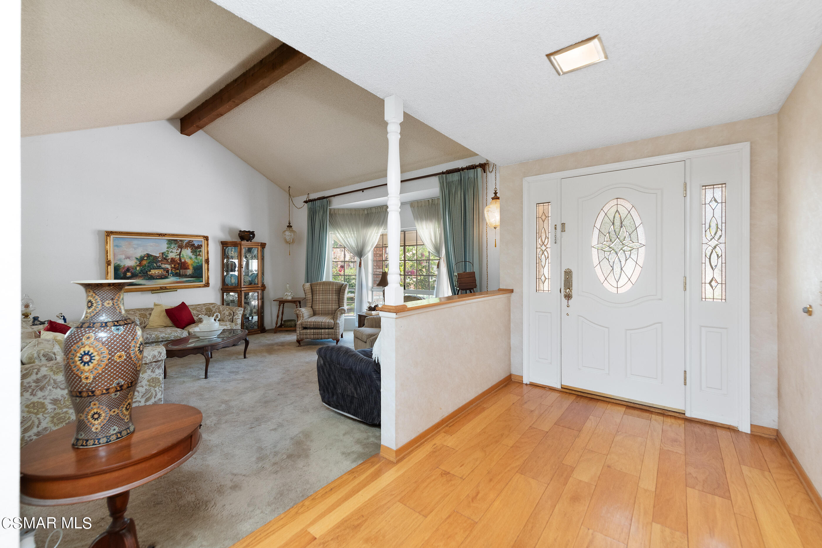 4230 Roxbury Street Simi Valley, CA 93063 - Photo 7 of 40 a living room with furniture and a flat screen tv