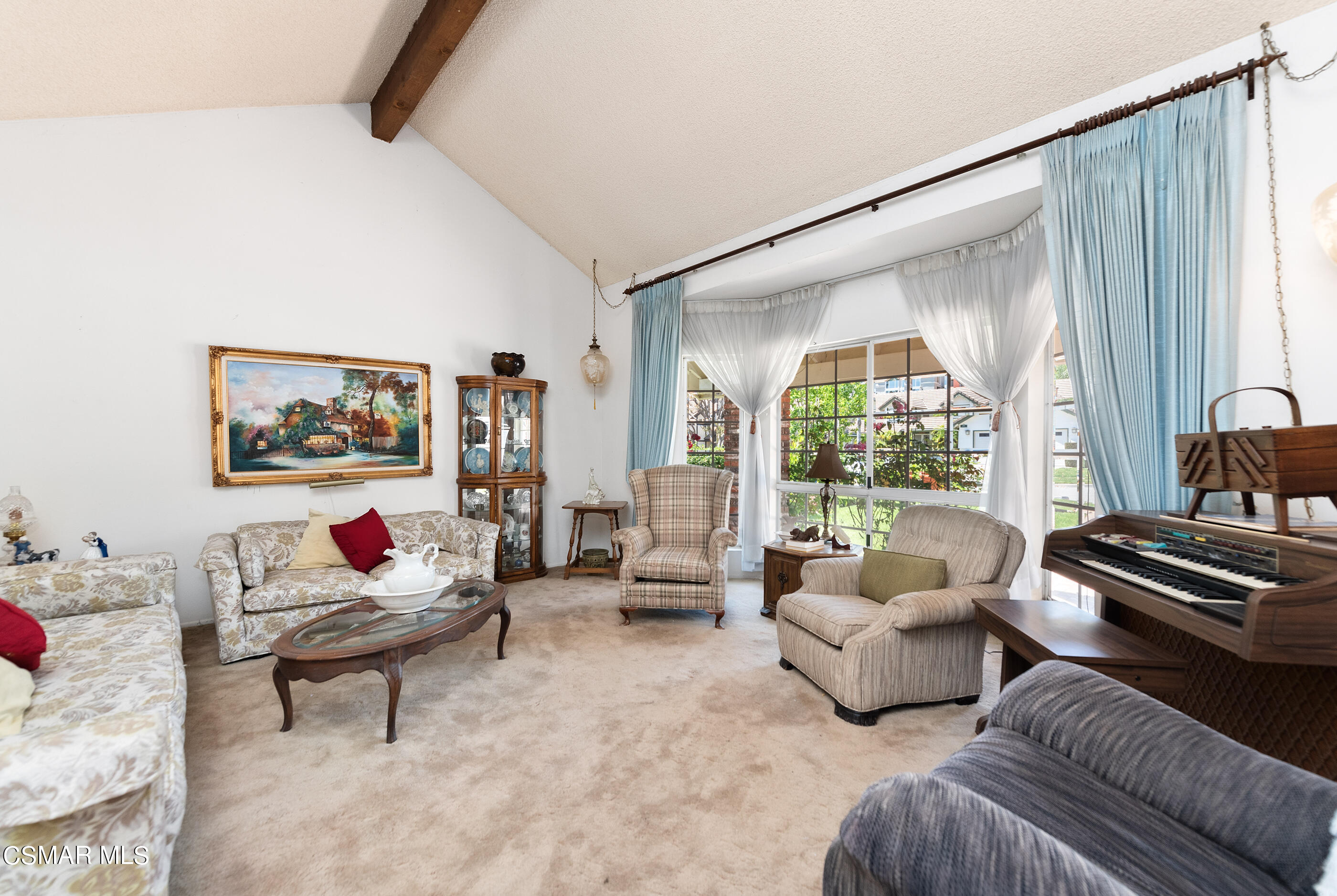 4230 Roxbury Street Simi Valley, CA 93063 - Photo 8 of 40 a living room with furniture and a large window