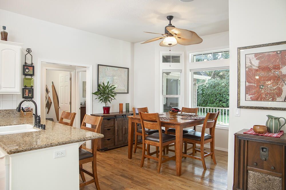 375 Oak Ranch Road Grants Pass, OR 97526 - Photo 5 of 57 a view of a dining room with furniture window and wooden floor