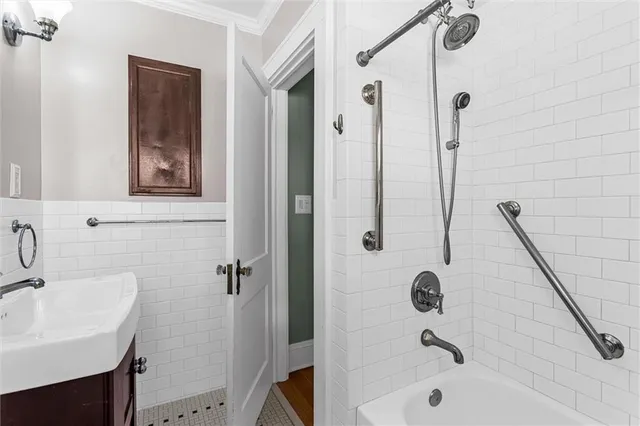 a view of a white house with a yard