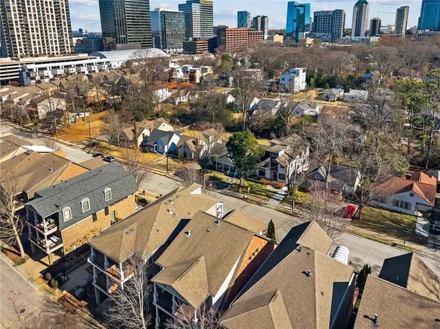 a view of a city with tall buildings