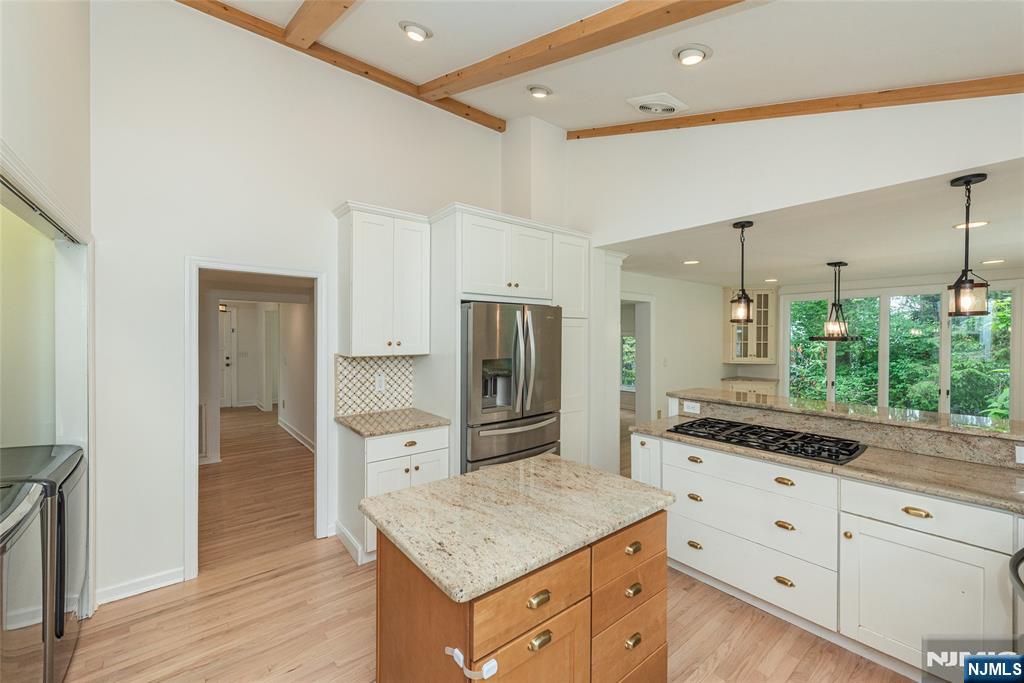 163 Sand Spring Road Morristown, NJ 07960 - Photo 10 of 39 a kitchen with white cabinets and window