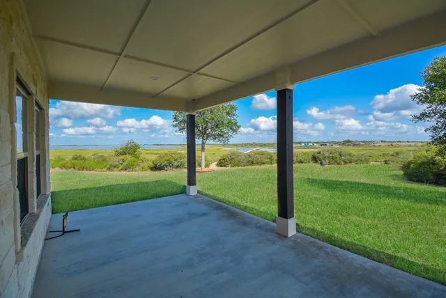 a view of a yard with porch