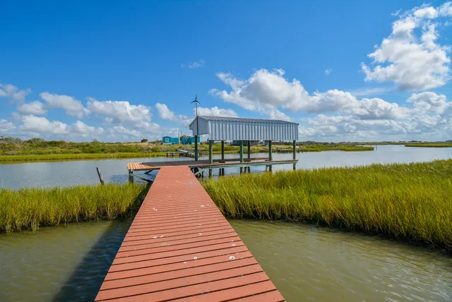 a view of a lake with a big yard