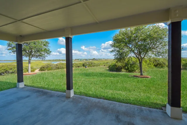 a view of a yard with porch