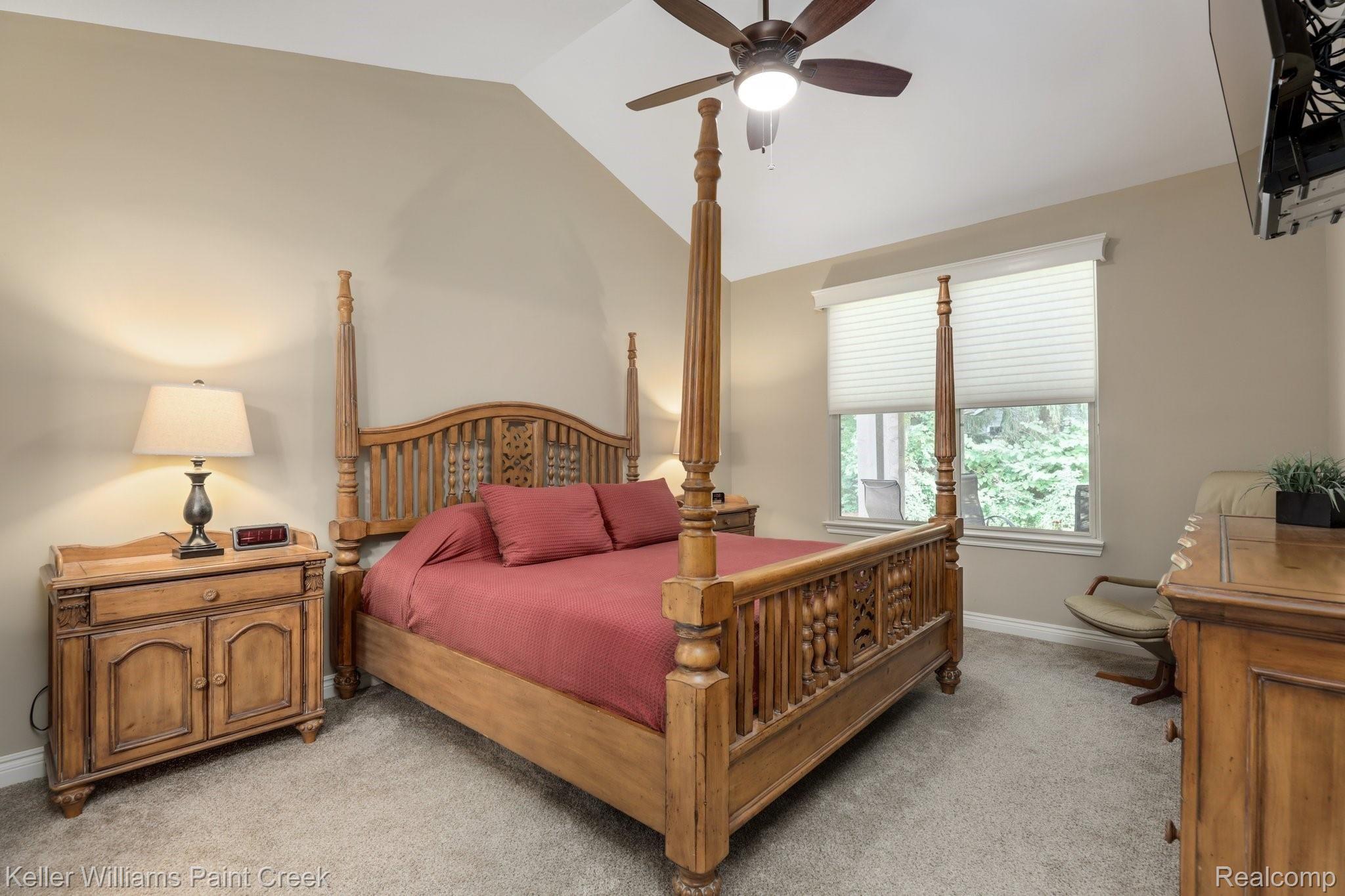 1027 Hampshire Court Rochester, MI 48307 - Photo 8 of 30 Master suite is peaceful with a view to the treed backdrop.