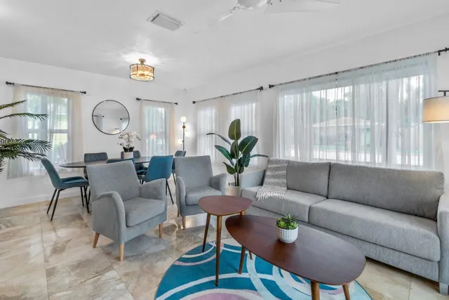 a kitchen with stainless steel appliances granite countertop a stove and cabinets