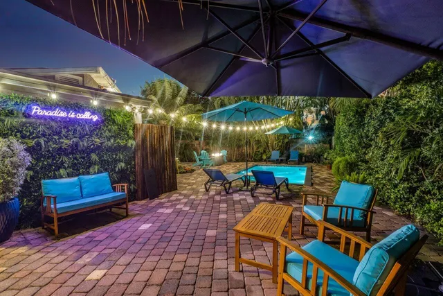 front view of a building with a garden