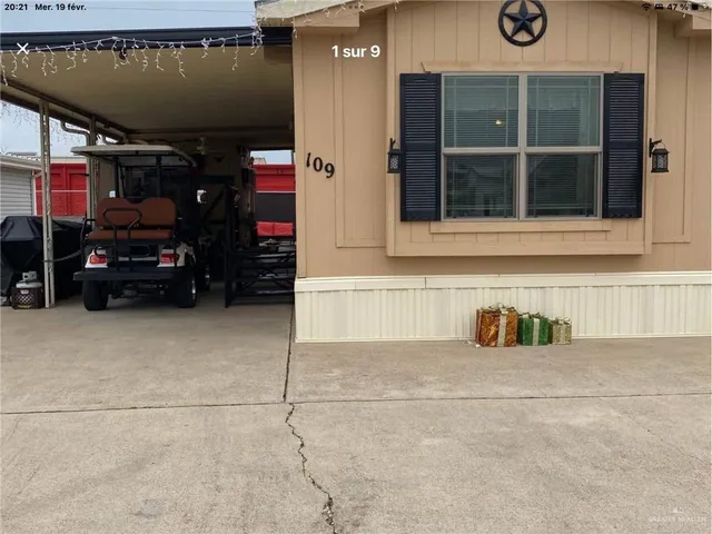a kitchen with stainless steel appliances granite countertop a table and chairs