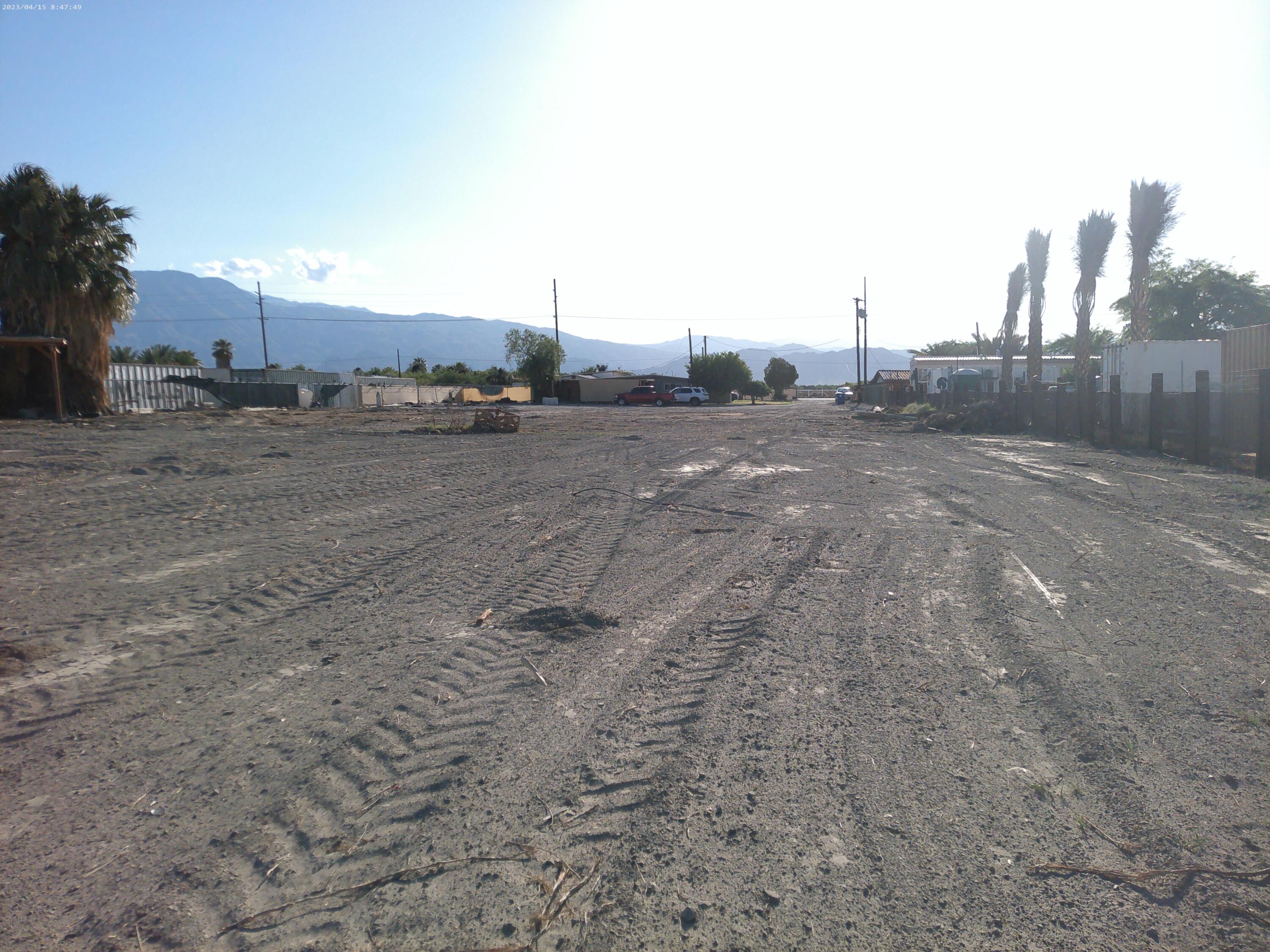 54878 Harrison Street Thermal, CA 92274 - Photo 12 of 58 a view of a dry yard with wooden fence
