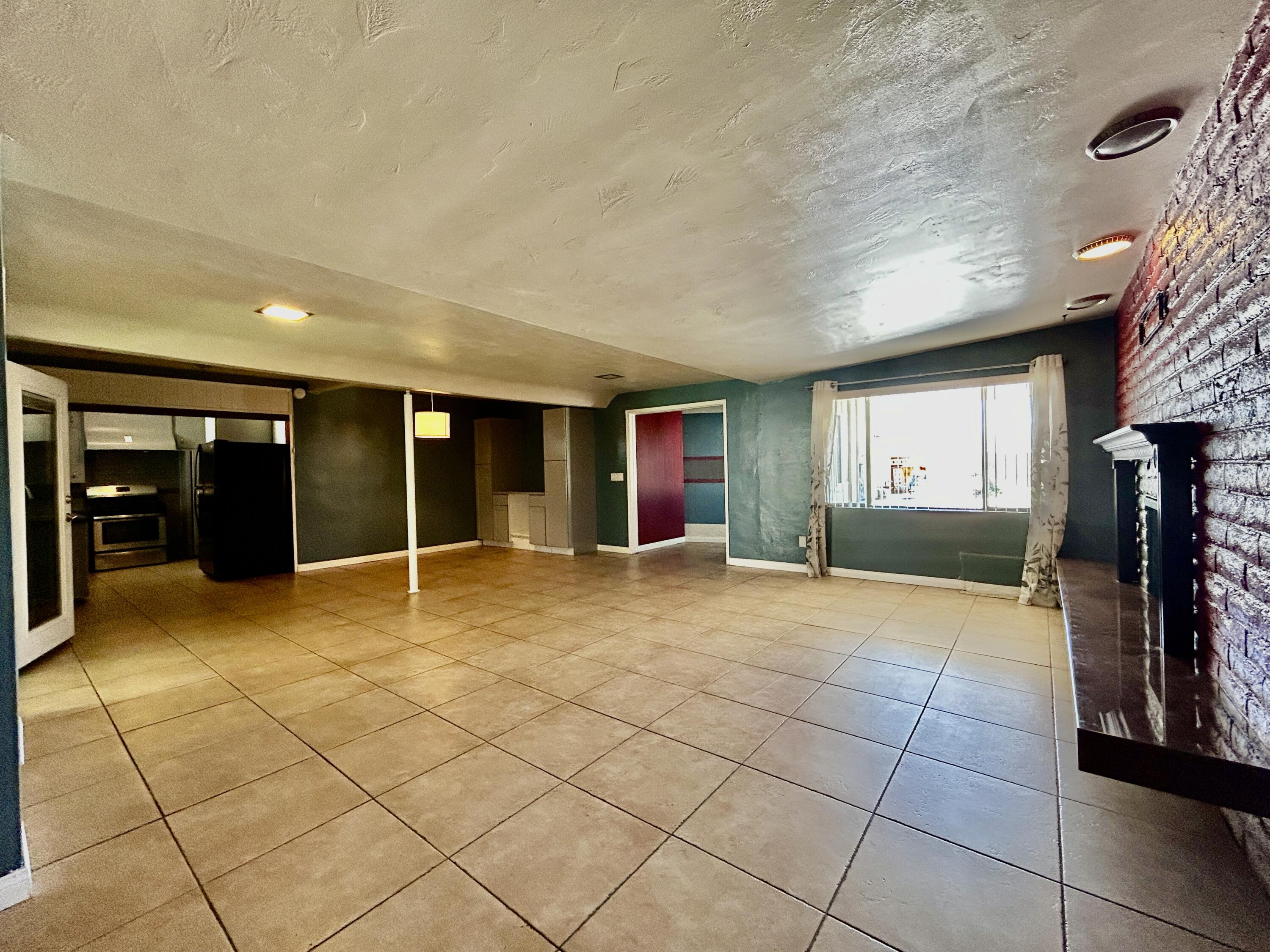54878 Harrison Street Thermal, CA 92274 - Photo 16 of 58 a view of livingroom with furniture and window