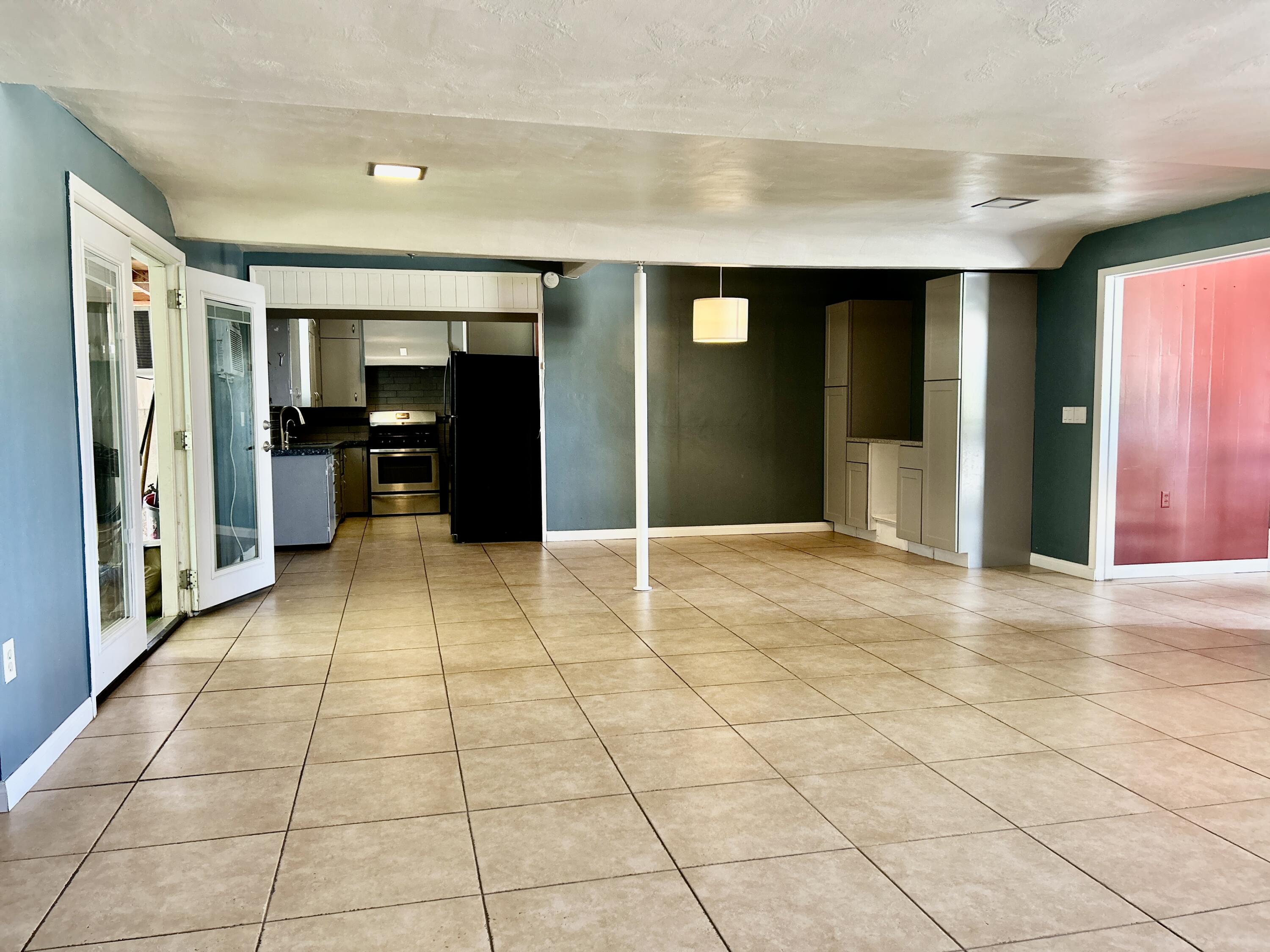 54878 Harrison Street Thermal, CA 92274 - Photo 17 of 58 a view of a hallway with wooden shelves