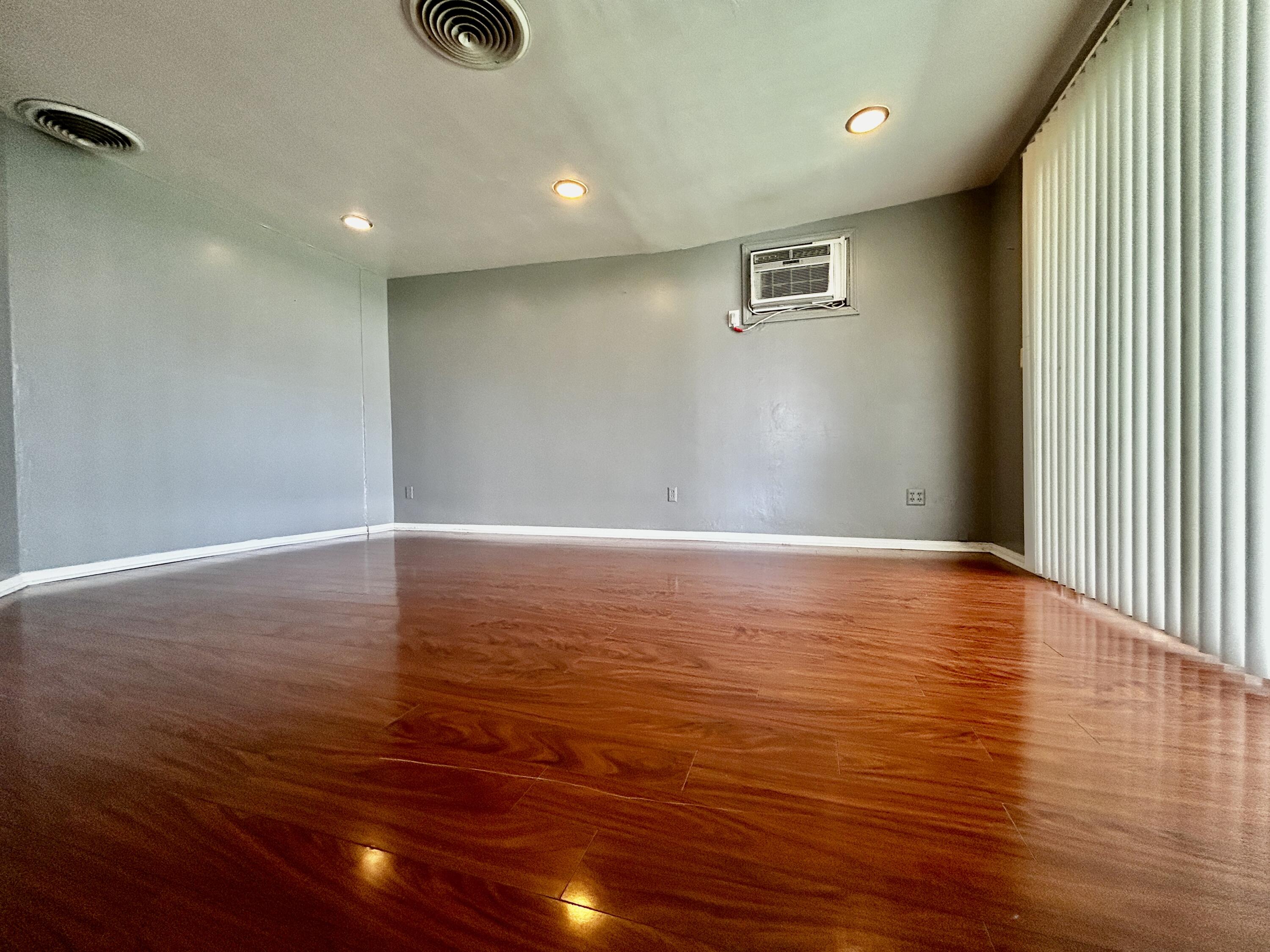54878 Harrison Street Thermal, CA 92274 - Photo 25 of 58 a view of room and wooden floor