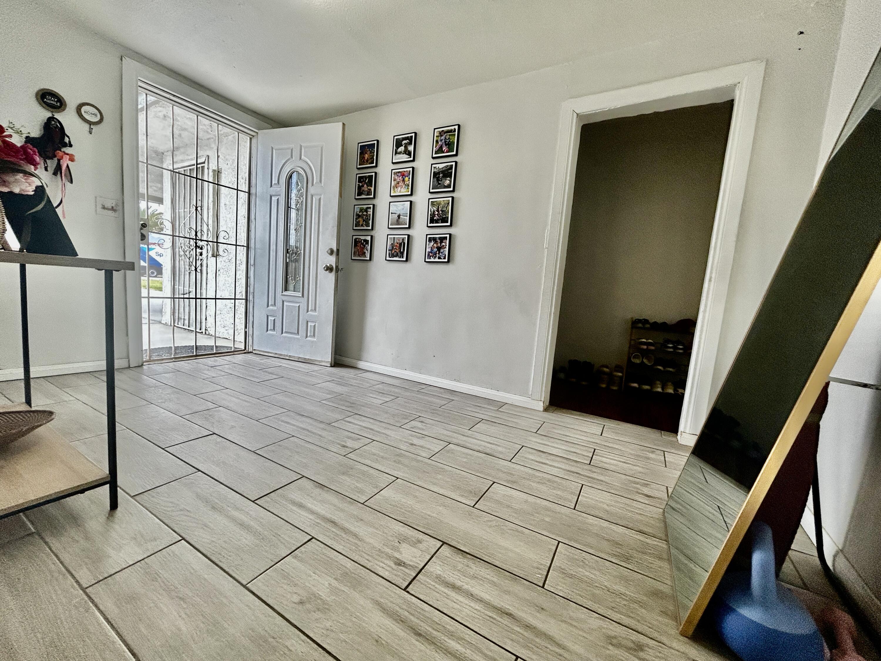 54878 Harrison Street Thermal, CA 92274 - Photo 40 of 58 a view of entryway with stairs and wooden floor