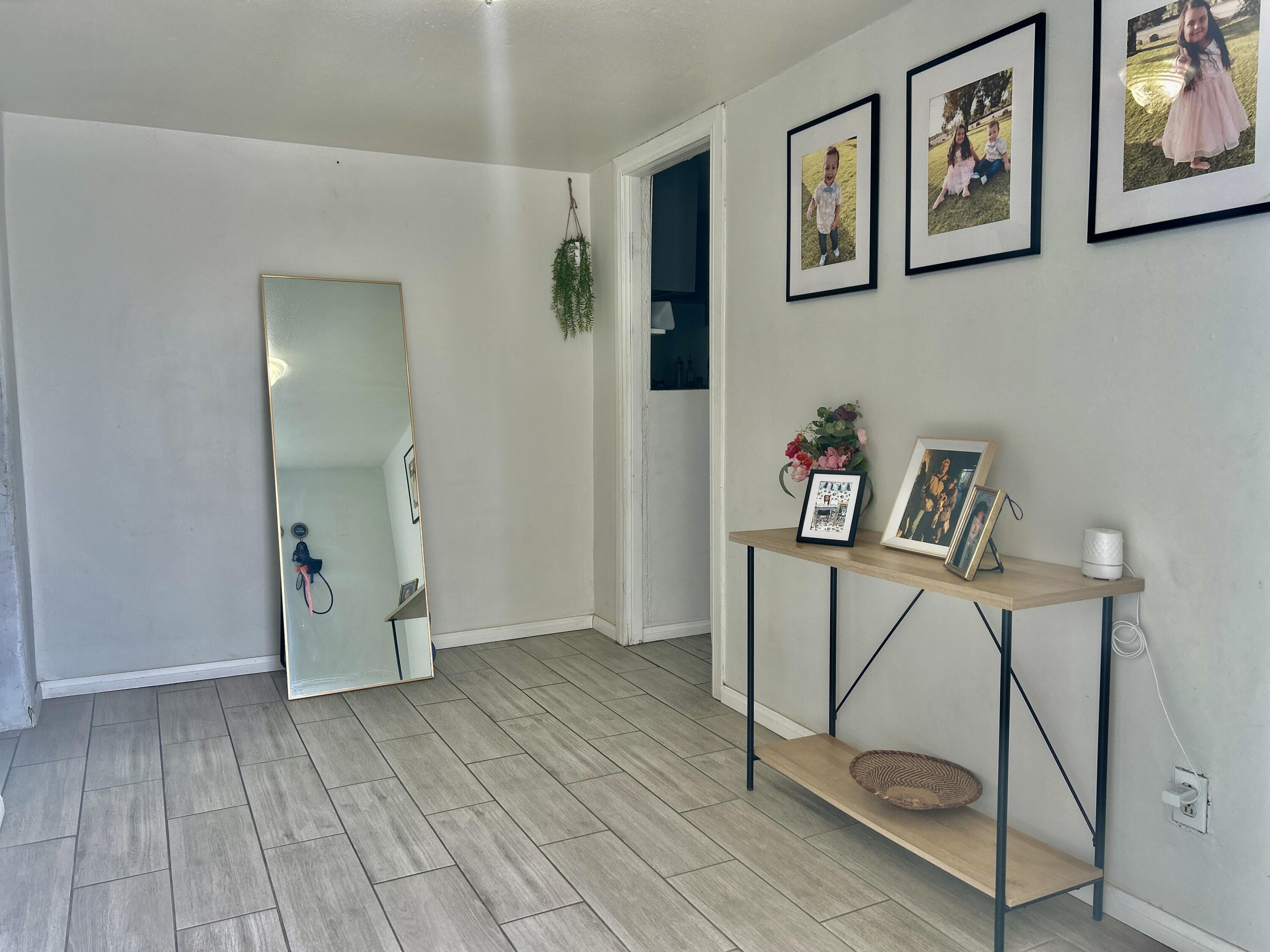 54878 Harrison Street Thermal, CA 92274 - Photo 41 of 58 a view of an entryway with wooden floor