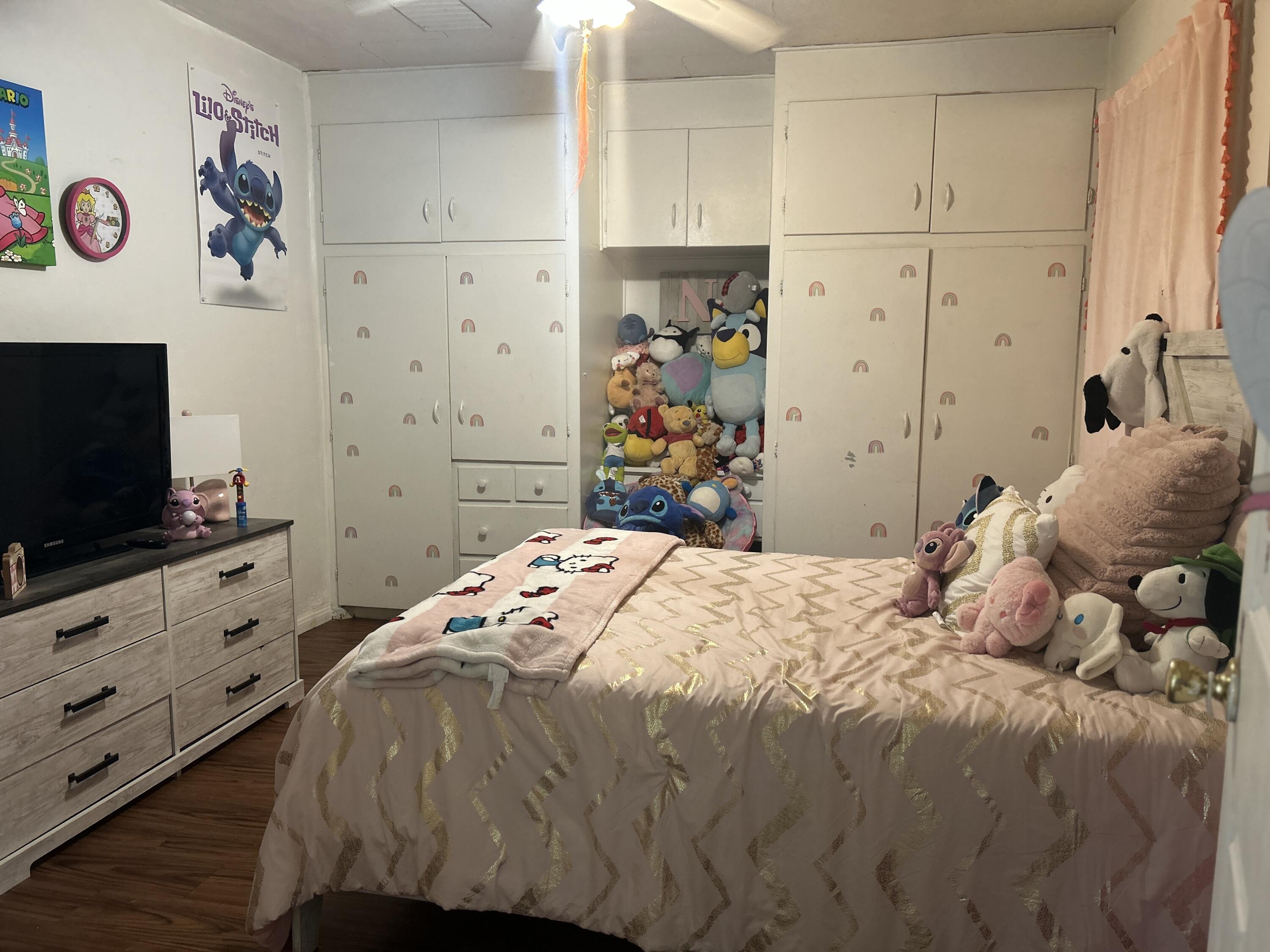 54878 Harrison Street Thermal, CA 92274 - Photo 48 of 58 a bedroom with a bed and a flat screen tv