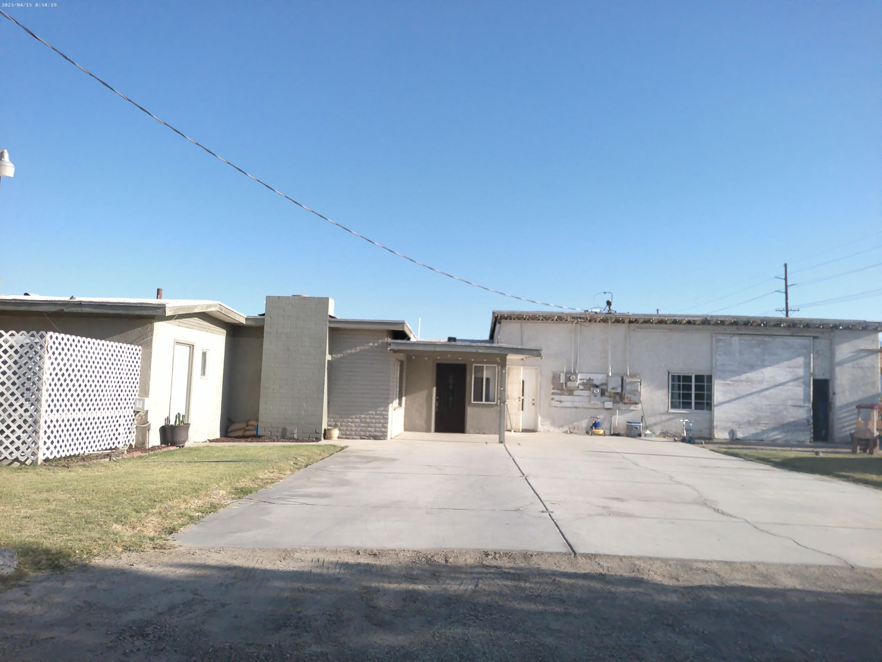 54878 Harrison Street Thermal, CA 92274 - Photo 55 of 58 a view of a house with backyard and a kitchen