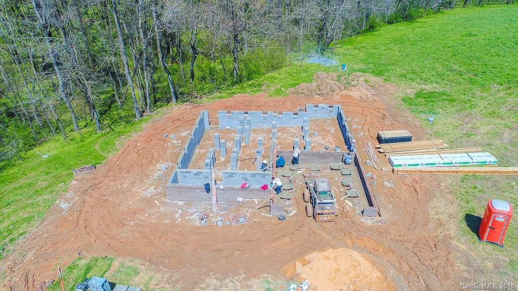 4723 Olive Branch Road Wingate, NC 28174 - Photo 6 of 6 a view of swimming pool with a yard