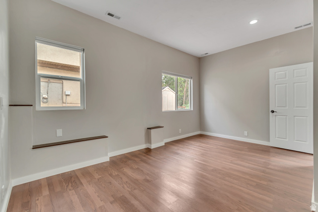 2154 Wasatch Boulevard Sandy, UT 84092 - Photo 52 of 55 Spare room featuring light wood-style floors and recessed lighting