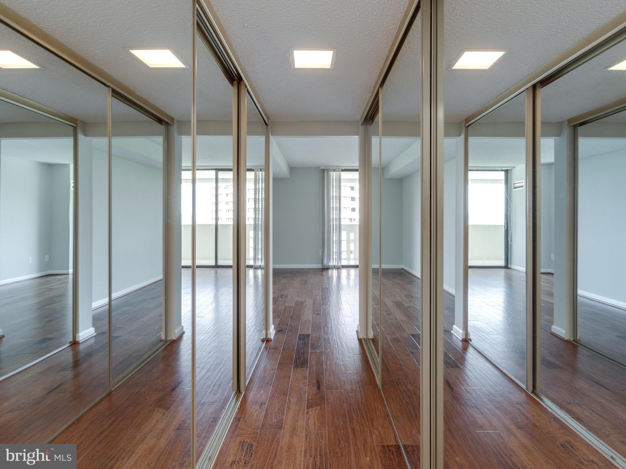 6101 Edsall Road, Unit 809 Alexandria, VA 22304 - Photo 13 of 27 BEDROOM HALLWAY - WALL-TO-WALL CLOSETS